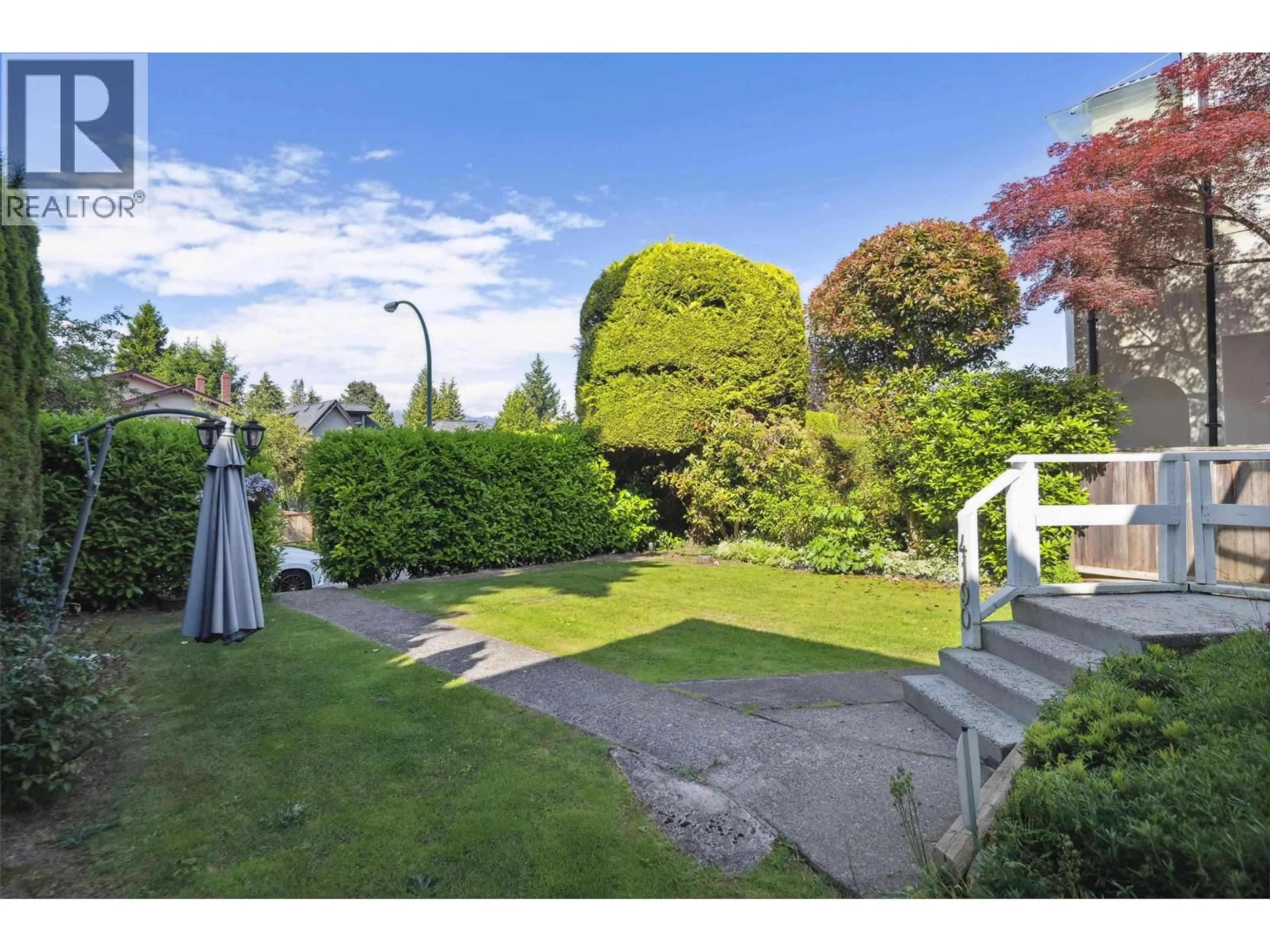 A pic from outside/outdoor area/front of a property/back of a property/a pic from drone, street for 4190 11TH AVENUE, Vancouver British Columbia V6R2L6