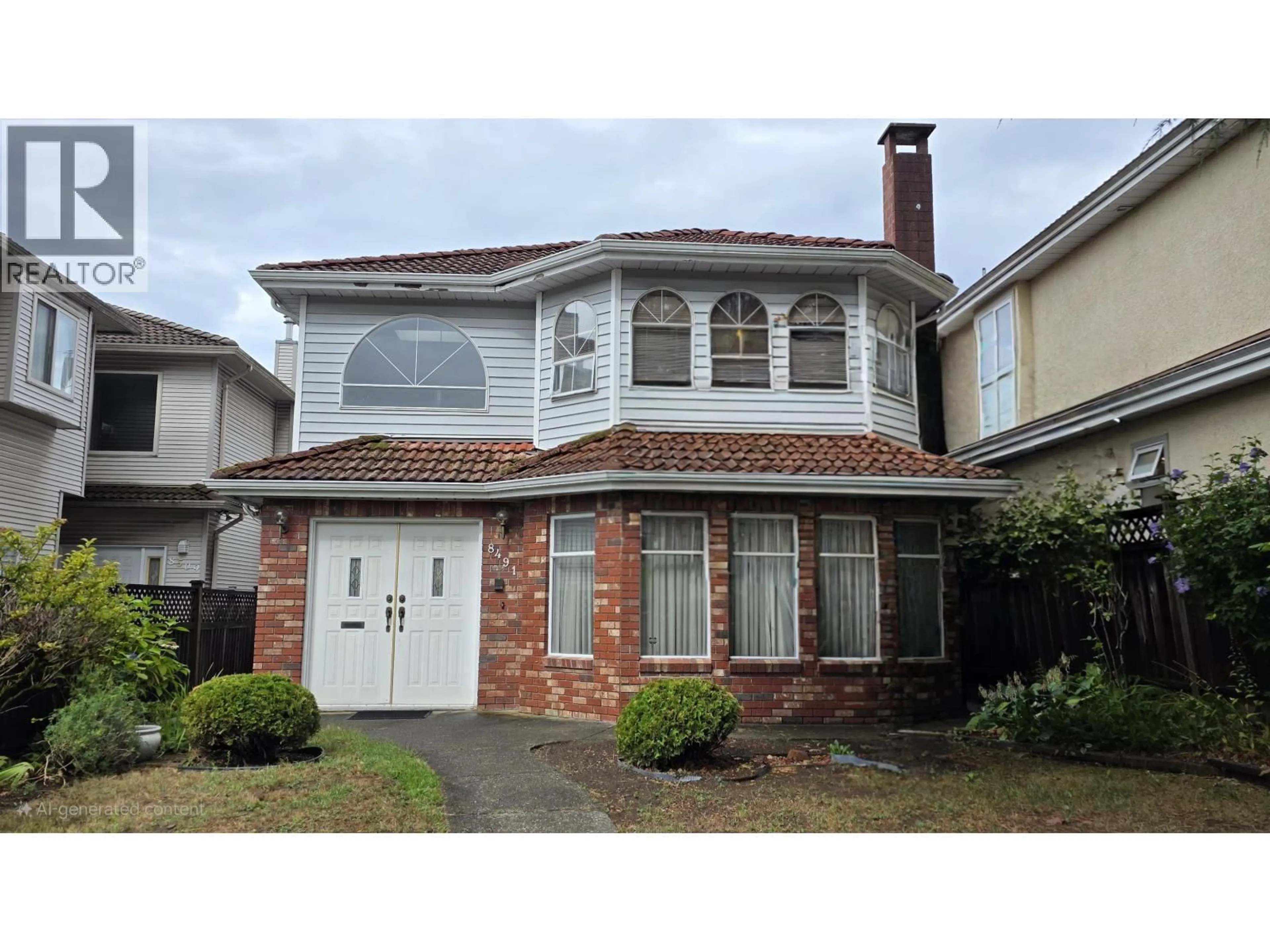 Home with vinyl exterior material, street for 8491 CARTIER STREET, Vancouver British Columbia V6P4T7