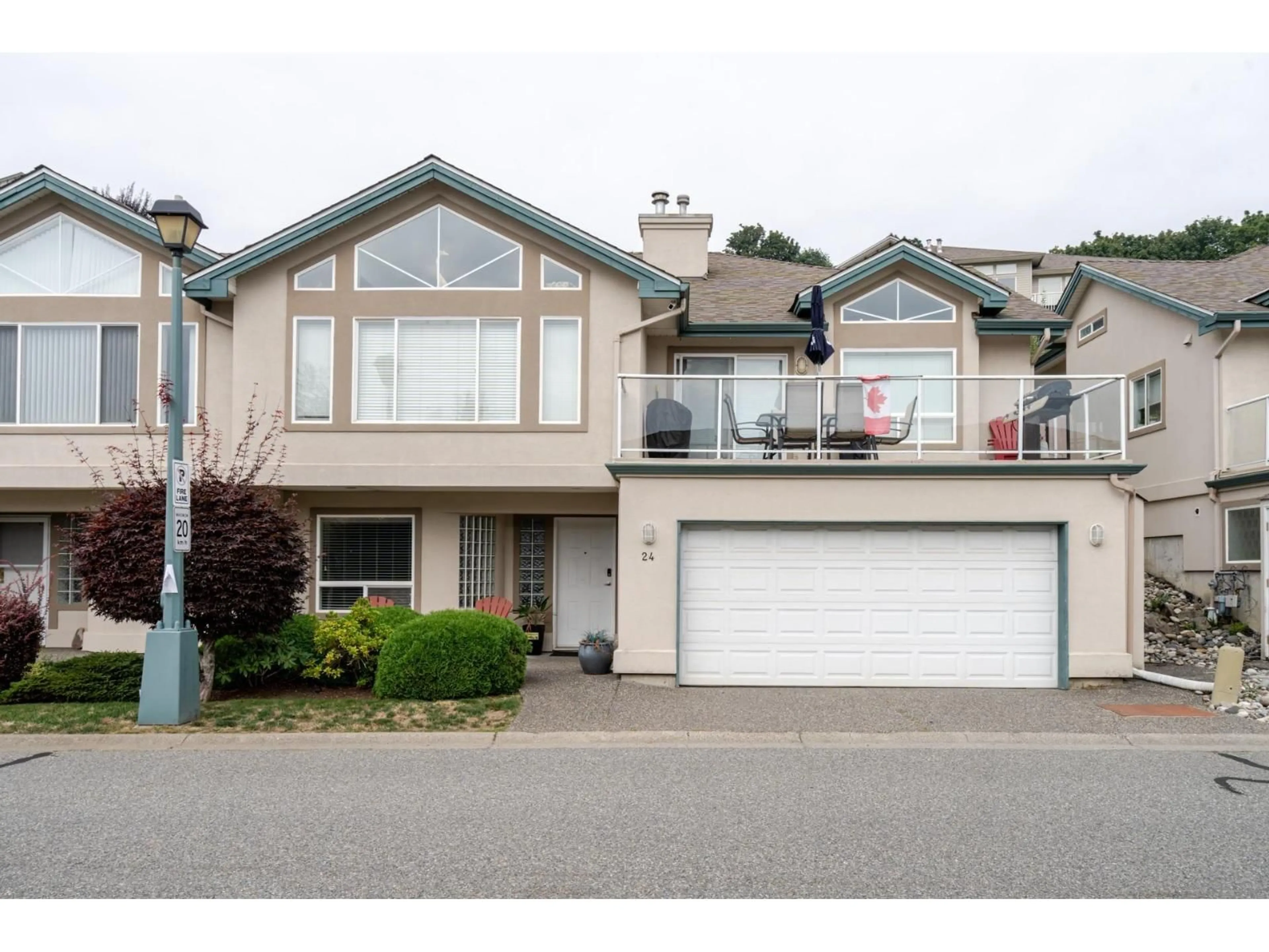 Home with vinyl exterior material, street for 24 - 8590 SUNRISE DRIVE, Chilliwack British Columbia V2R3Z4