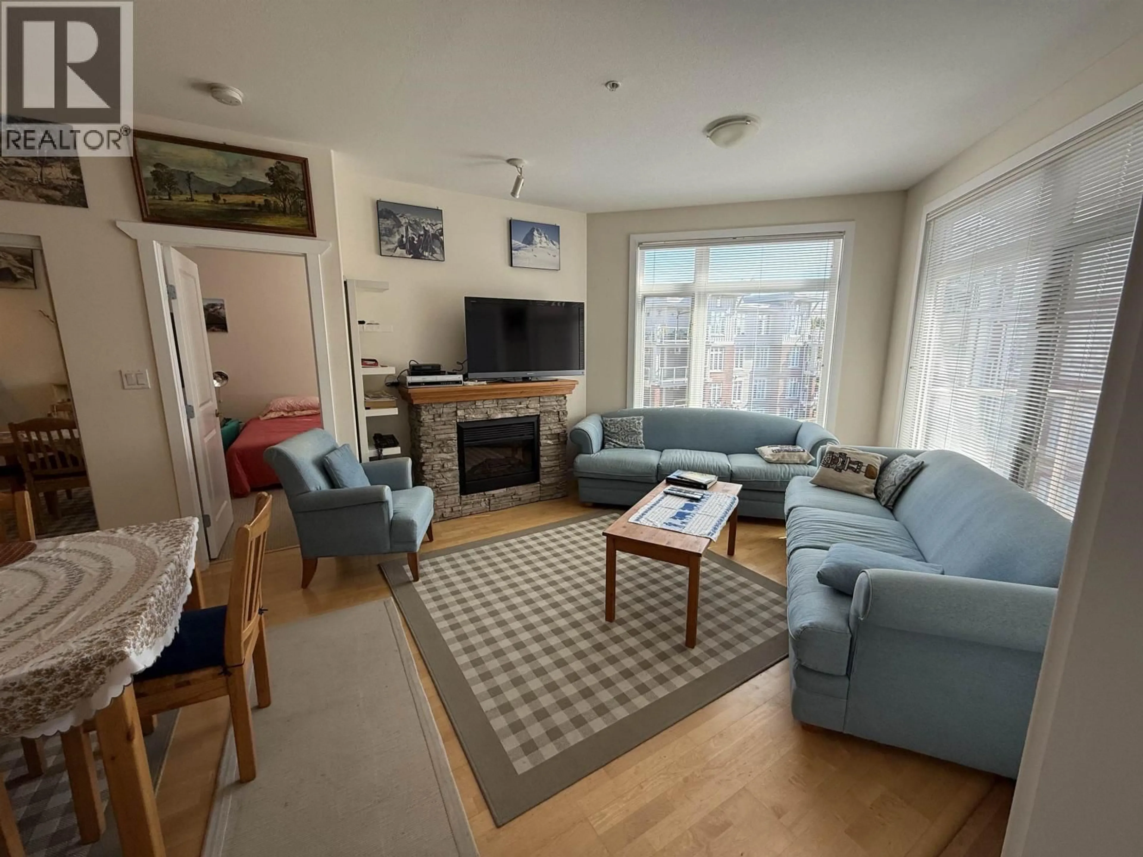 Living room with furniture, floor is not visible for 311 - 4211 BAYVIEW STREET, Richmond British Columbia V7E6T6