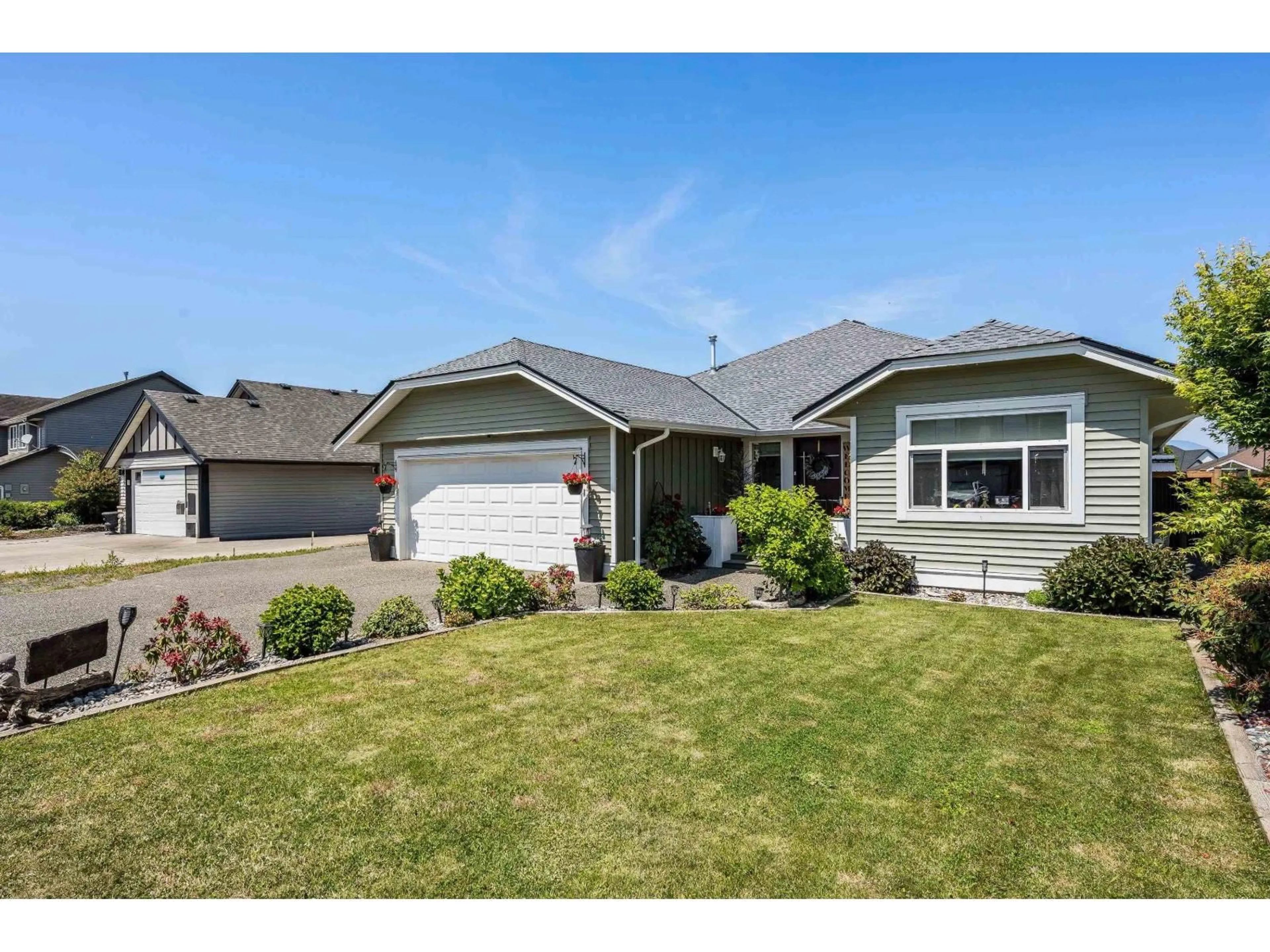 Home with vinyl exterior material, street for 46481 RANCHERO DRIVE, Chilliwack British Columbia V4Z1K3