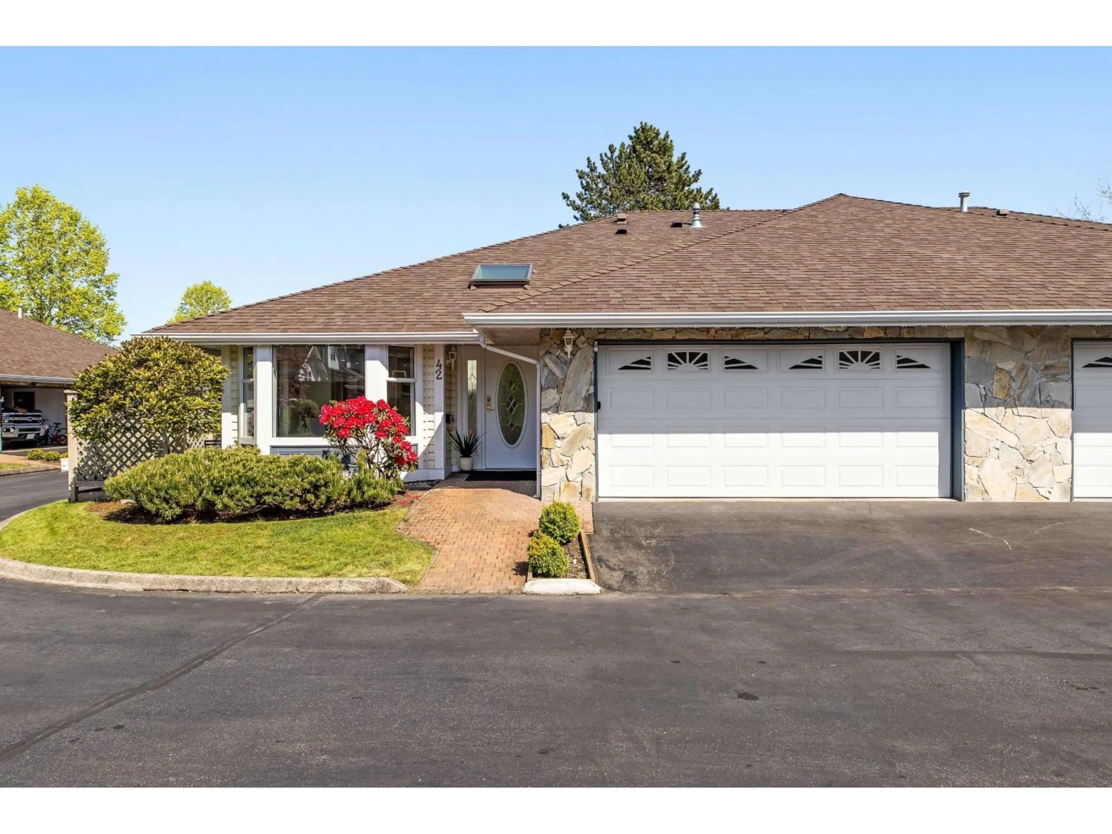 Home with vinyl exterior material, street for 42 - 21746 52, Langley British Columbia V2Y1L4