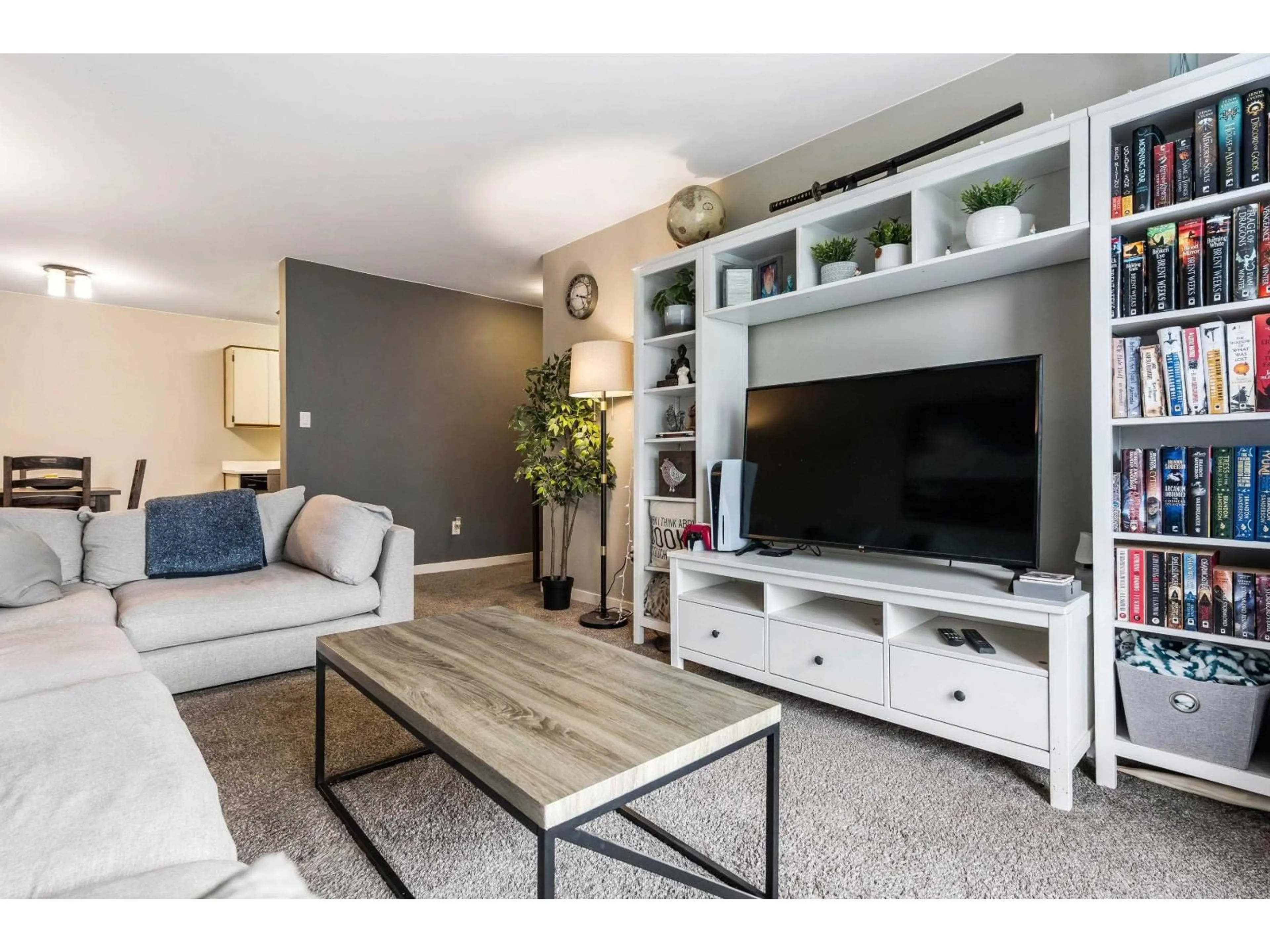 Living room with furniture, wood/laminate floor for 305 - 2750 FULLER, Abbotsford British Columbia V2S3K1