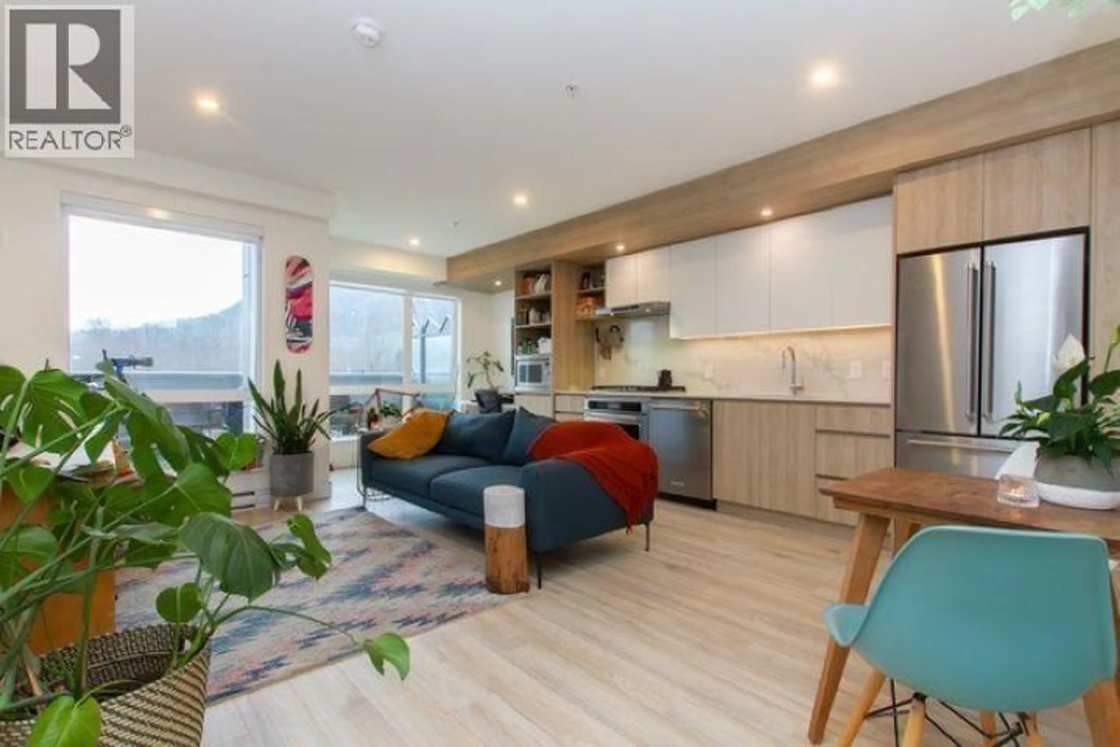 Living room with furniture, wood/laminate floor for 420 - 38362 BUCKLEY AVENUE, Squamish British Columbia V8B0J8