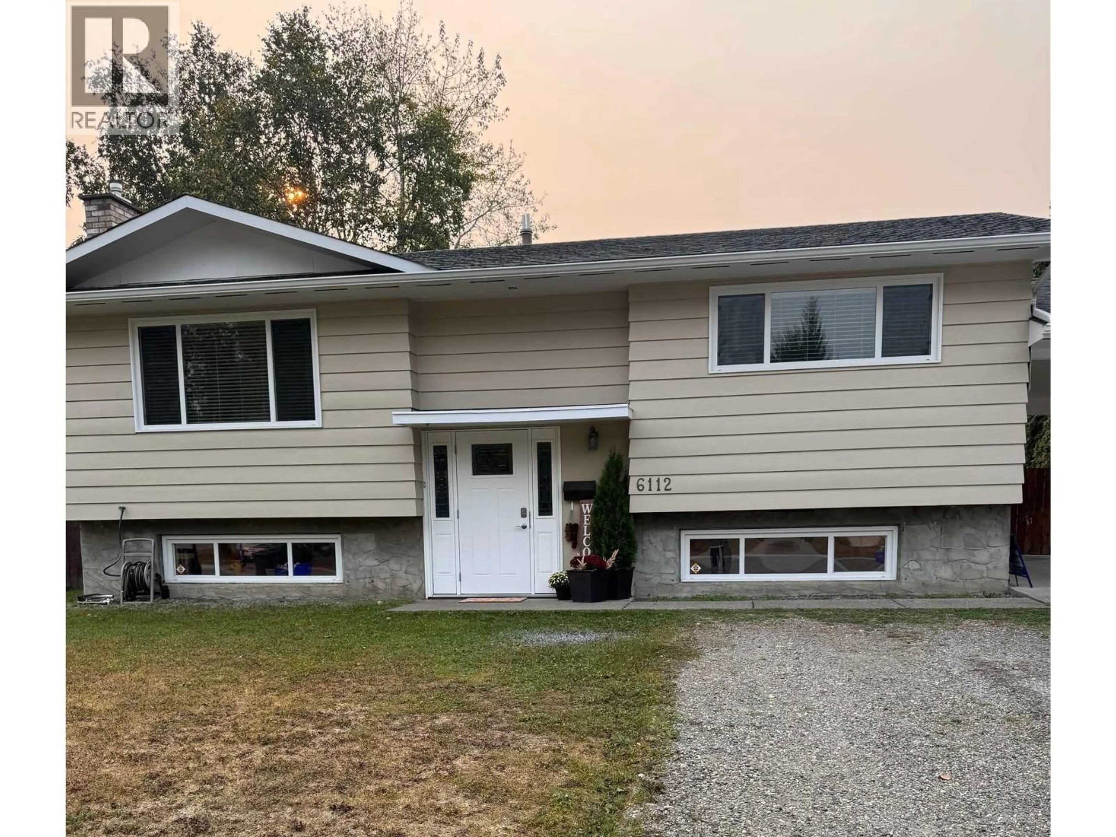 Home with vinyl exterior material, street for 6112 TRENT DRIVE, Prince George British Columbia V2N2G5
