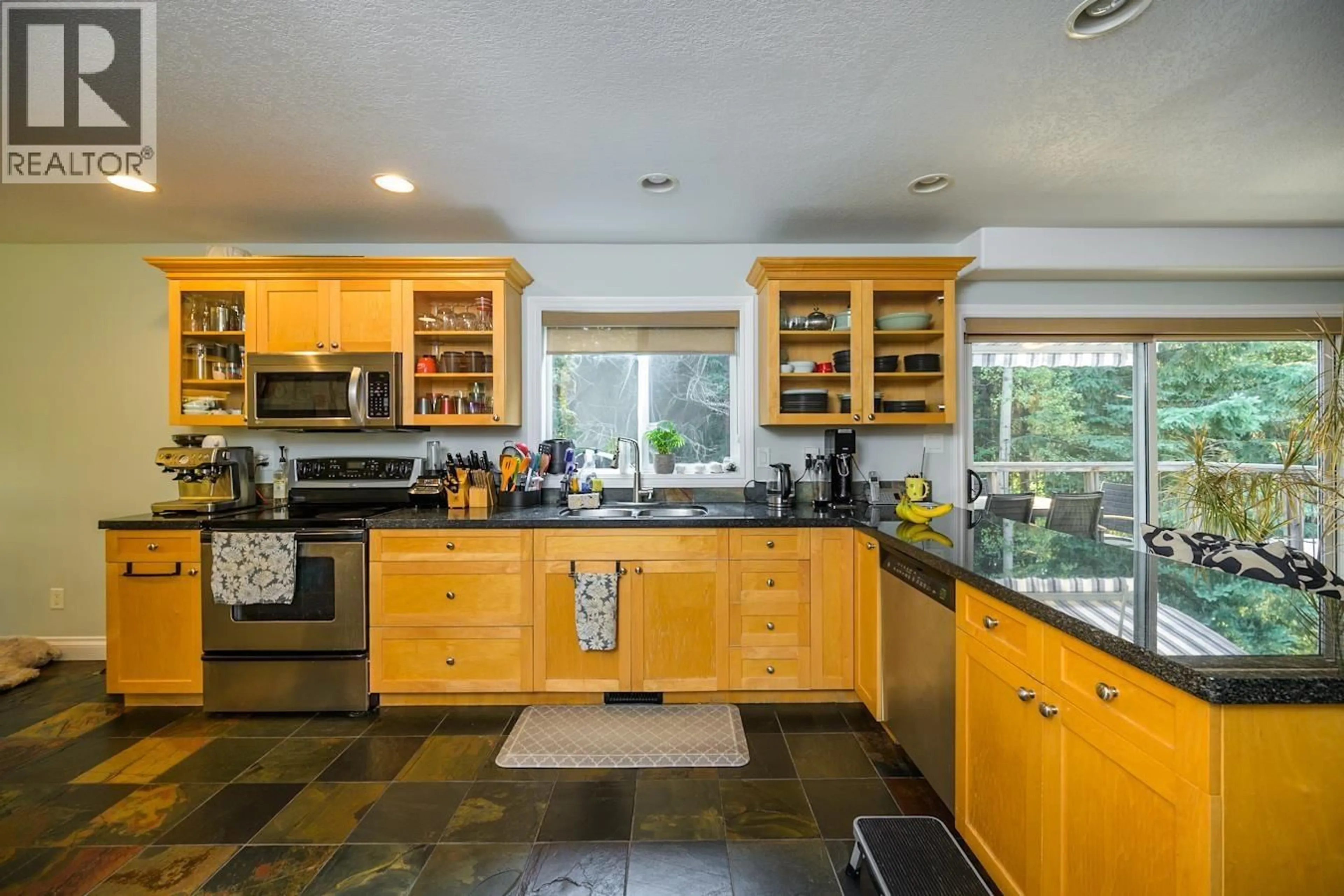 Open concept kitchen, ceramic/tile floor for 2505 BERNARD ROAD, Prince George British Columbia V2N5M1