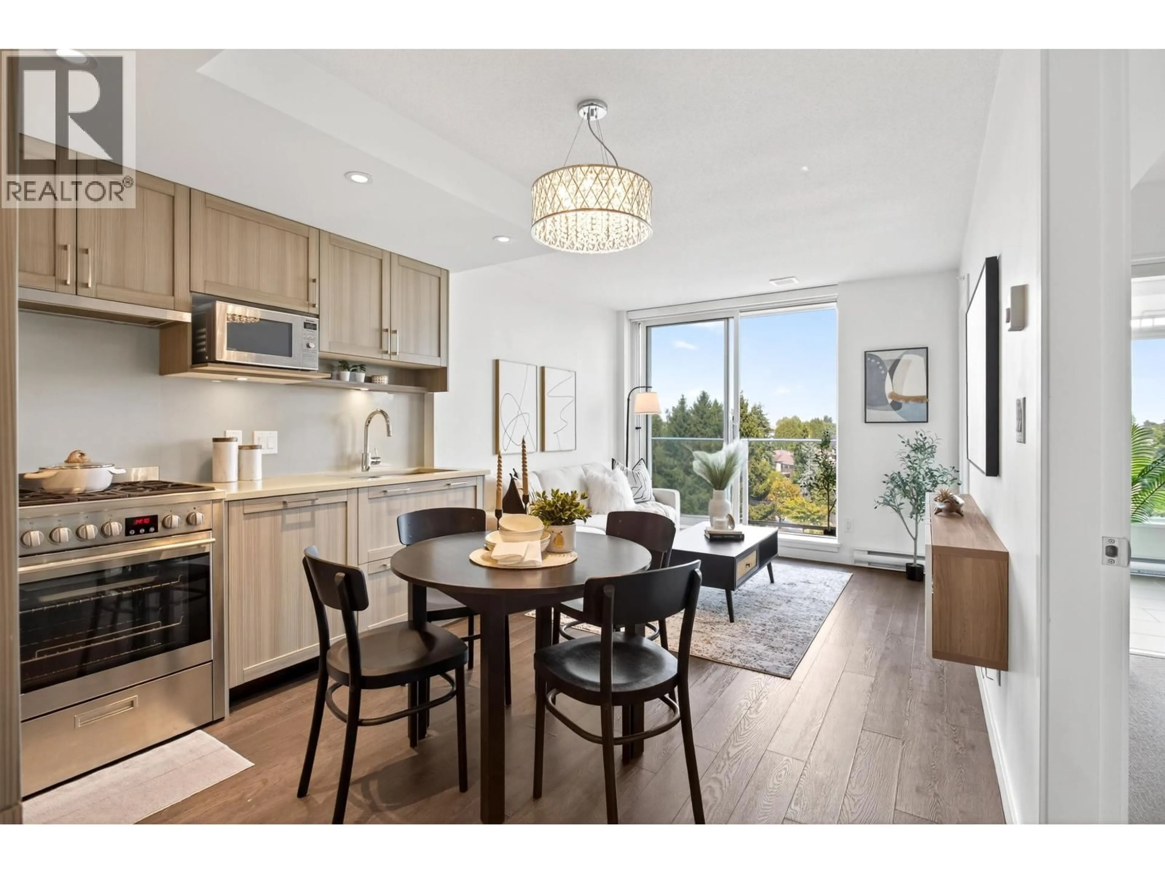 Open concept kitchen, wood/laminate floor for 1011 - 5470 ORMIDALE STREET, Vancouver British Columbia V5R0G6