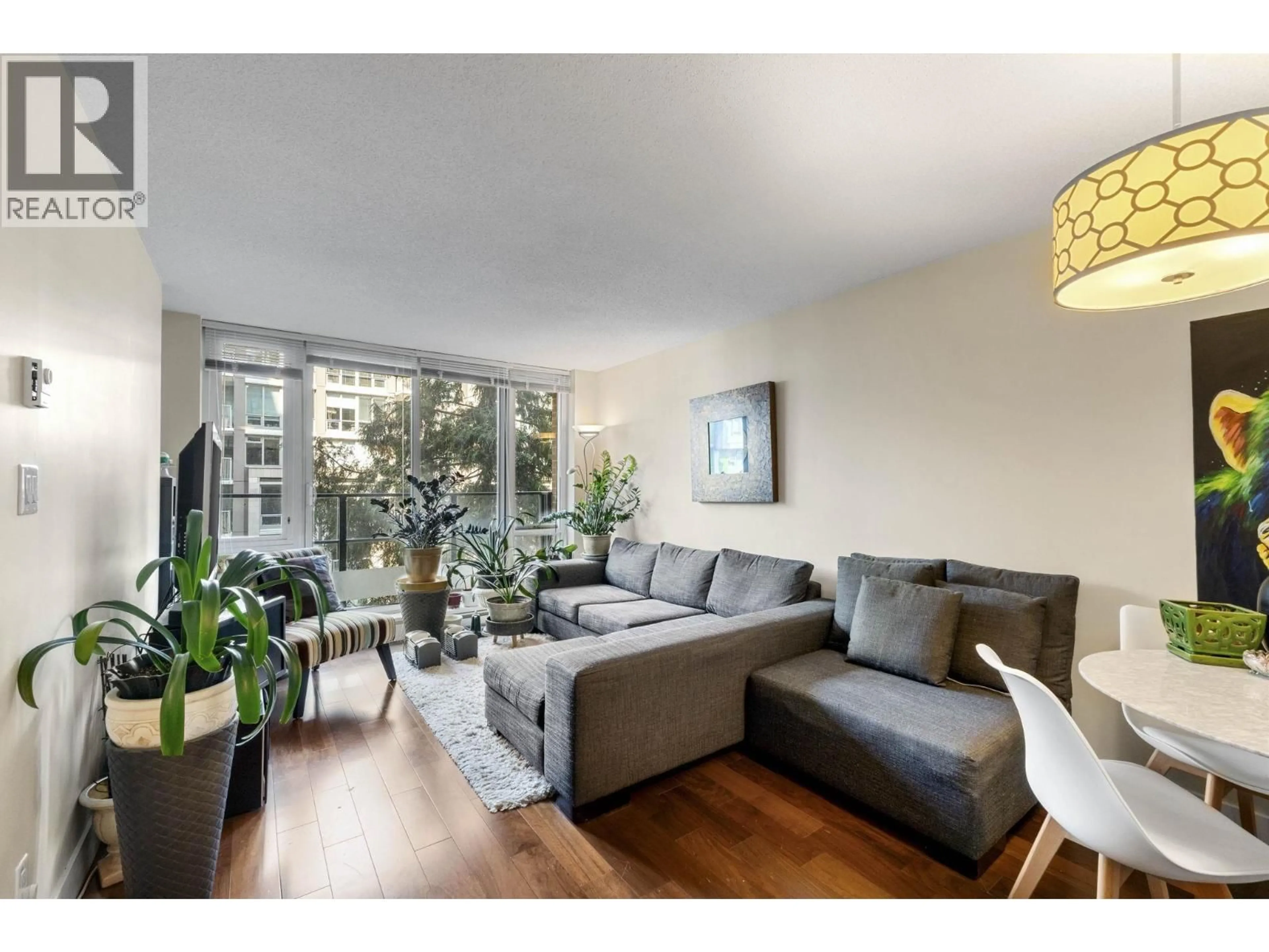 Living room with furniture, wood/laminate floor for 507 - 1088 RICHARDS STREET, Vancouver British Columbia V6B0J8