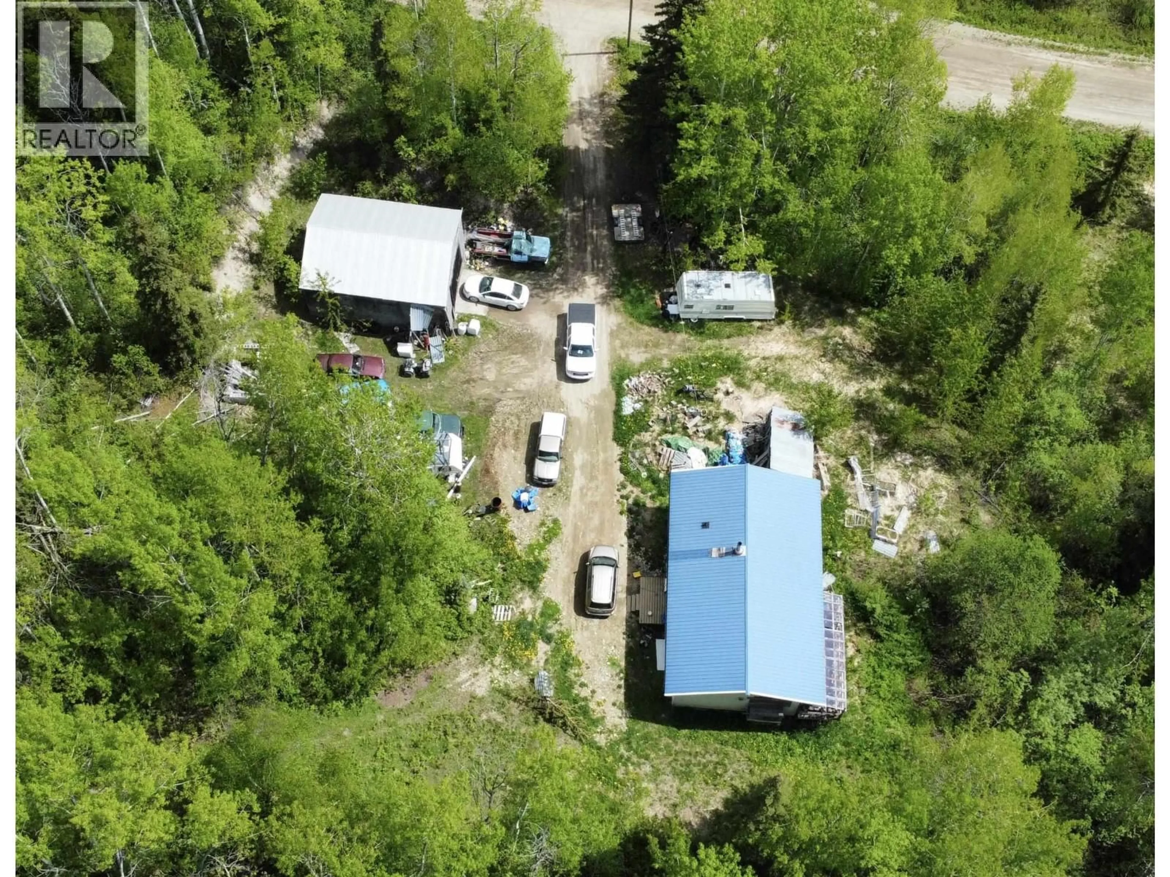 A pic from outside/outdoor area/front of a property/back of a property/a pic from drone, forest/trees view for 22105 ERICKSON ROAD, Prince George British Columbia V2K5X2