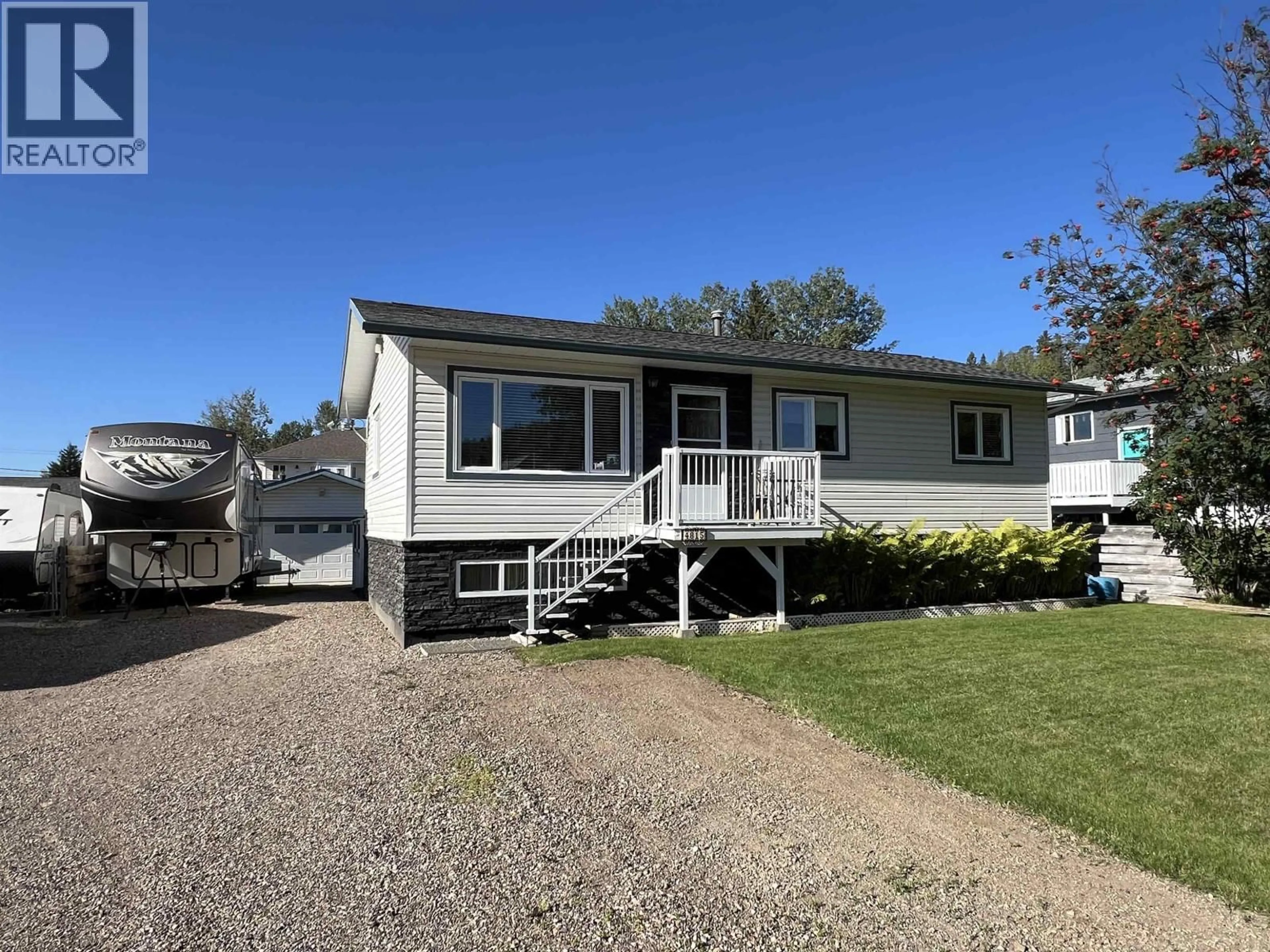 Home with vinyl exterior material, street for 4815 SPRUCE AVENUE, Fort Nelson British Columbia V0C1R0
