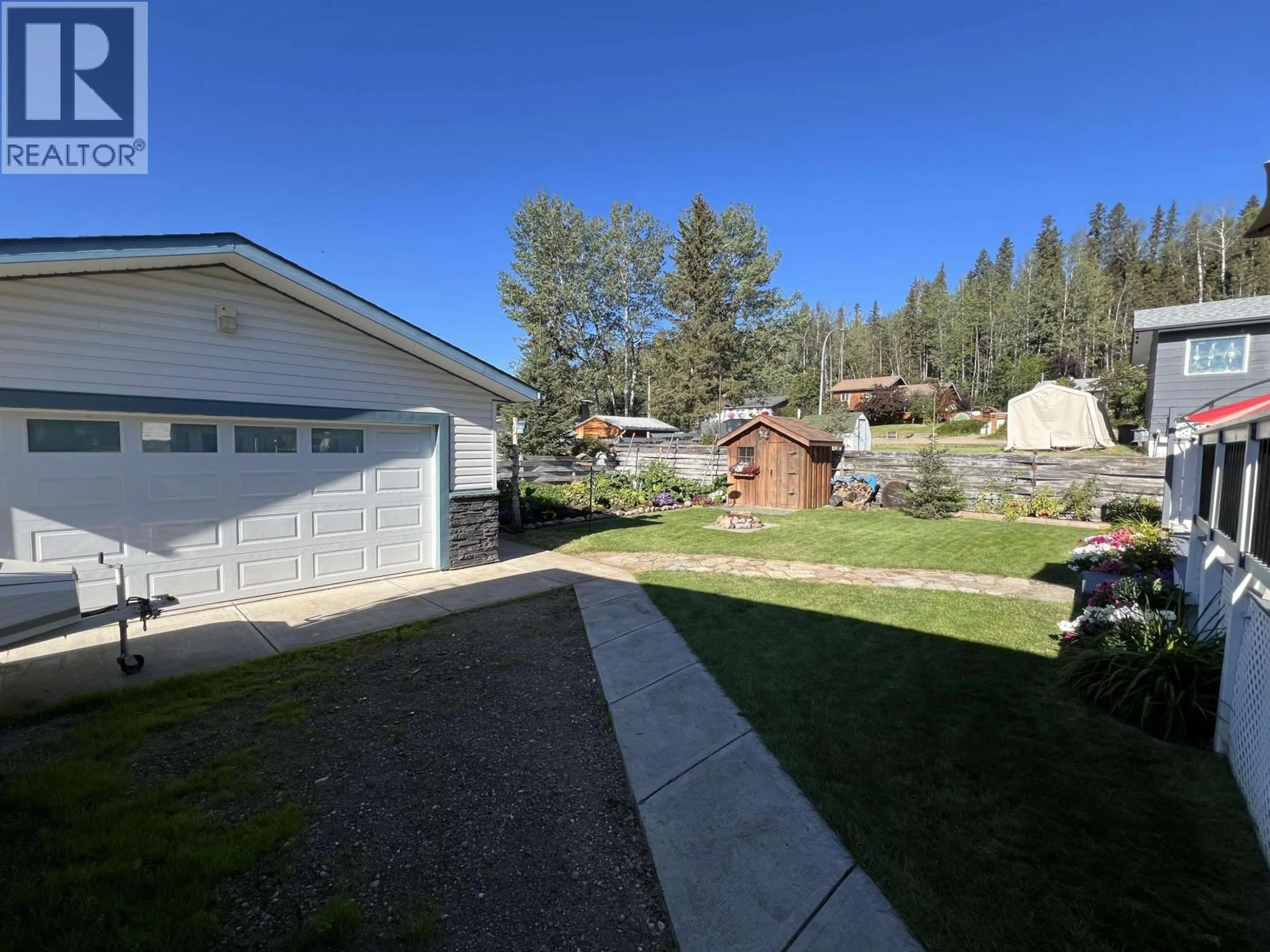 A pic from outside/outdoor area/front of a property/back of a property/a pic from drone, unknown for 4815 SPRUCE AVENUE, Fort Nelson British Columbia V0C1R0