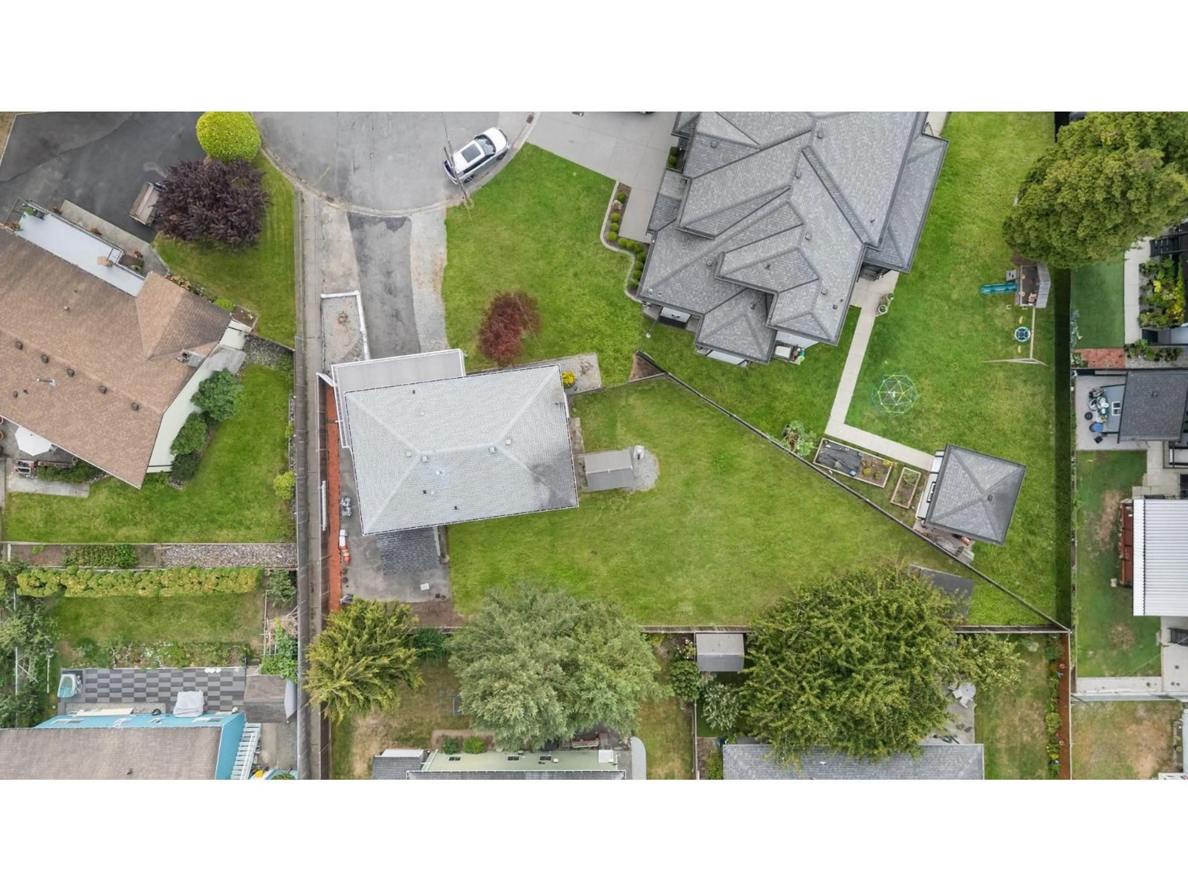A pic from outside/outdoor area/front of a property/back of a property/a pic from drone, street for 11170 EVANS, Delta British Columbia V4C1T2