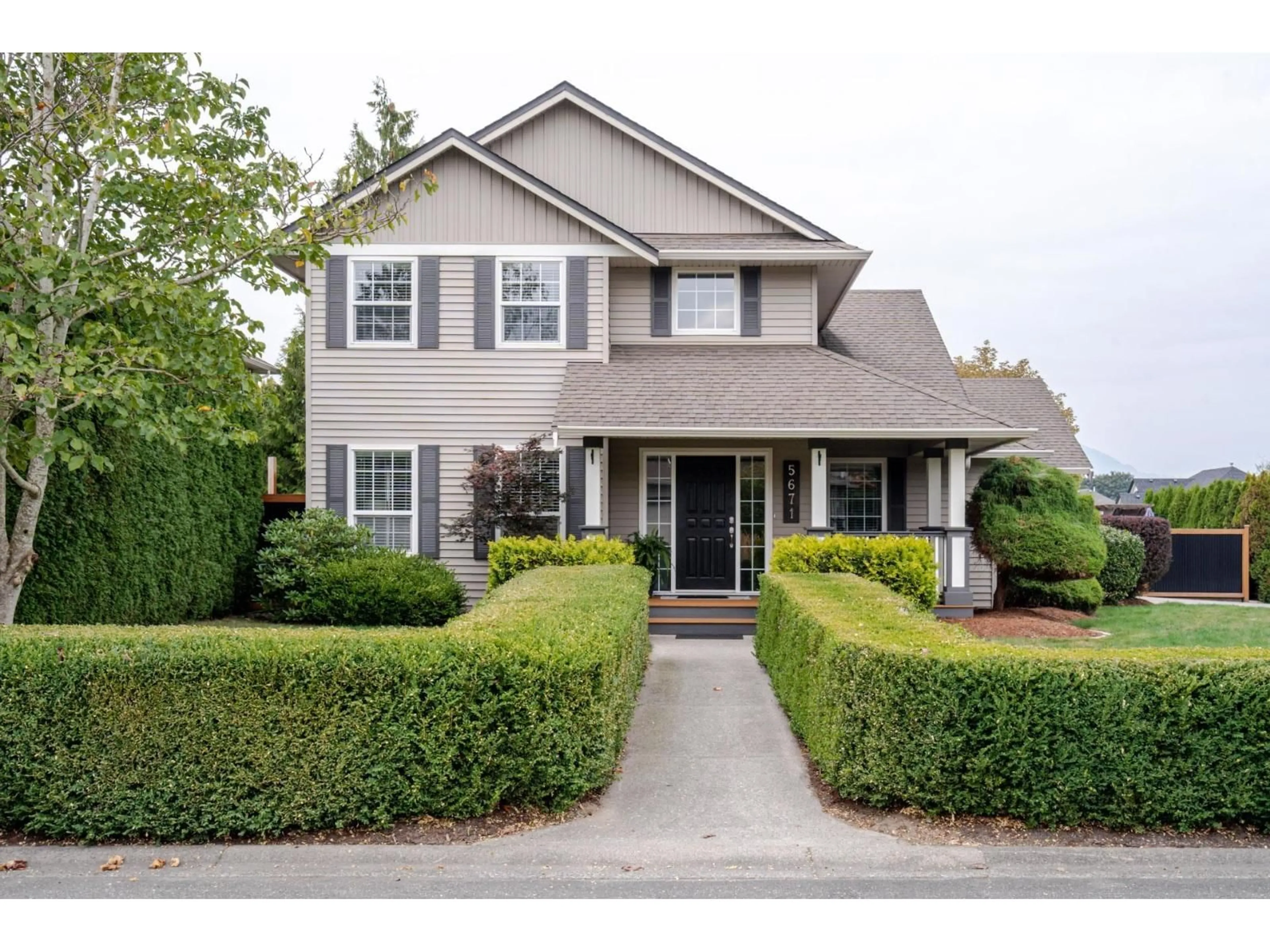 Home with vinyl exterior material, street for 5671 ELLEN STREET, Chilliwack British Columbia V2R5N5
