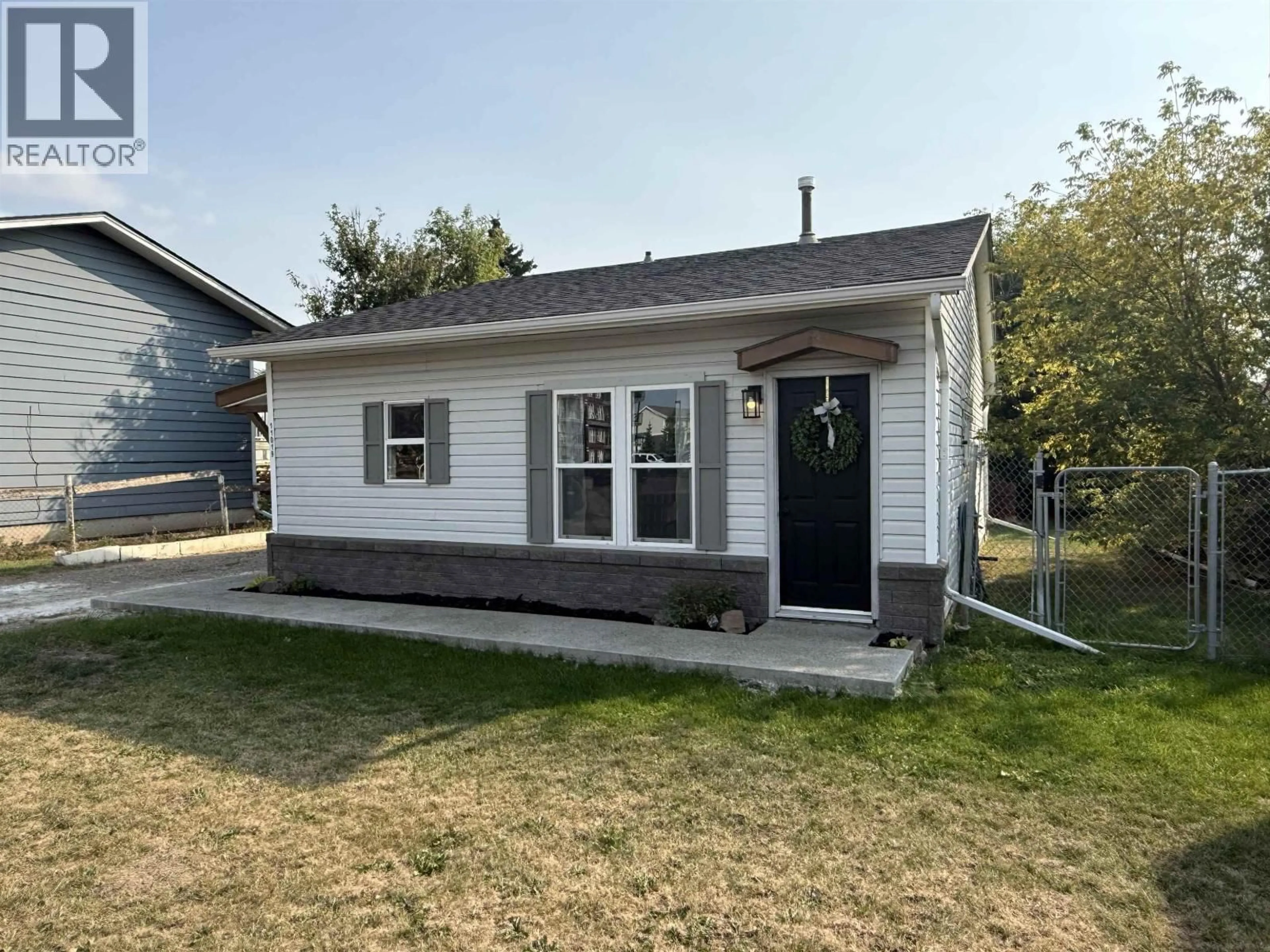 Home with vinyl exterior material, street for 11019 102 AVENUE, Fort St. John British Columbia V1J2G2