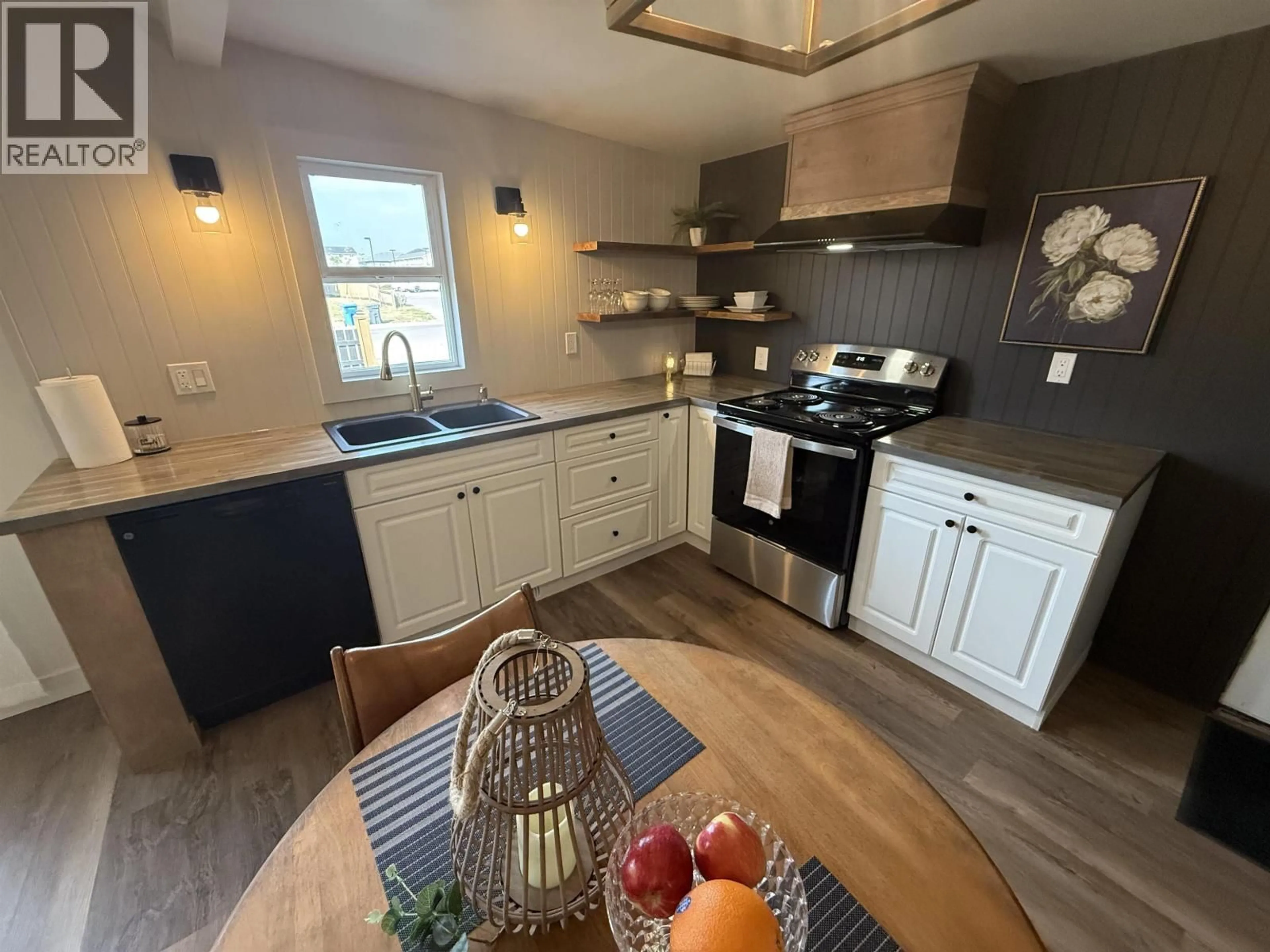 Open concept kitchen, unknown for 11019 102 AVENUE, Fort St. John British Columbia V1J2G2