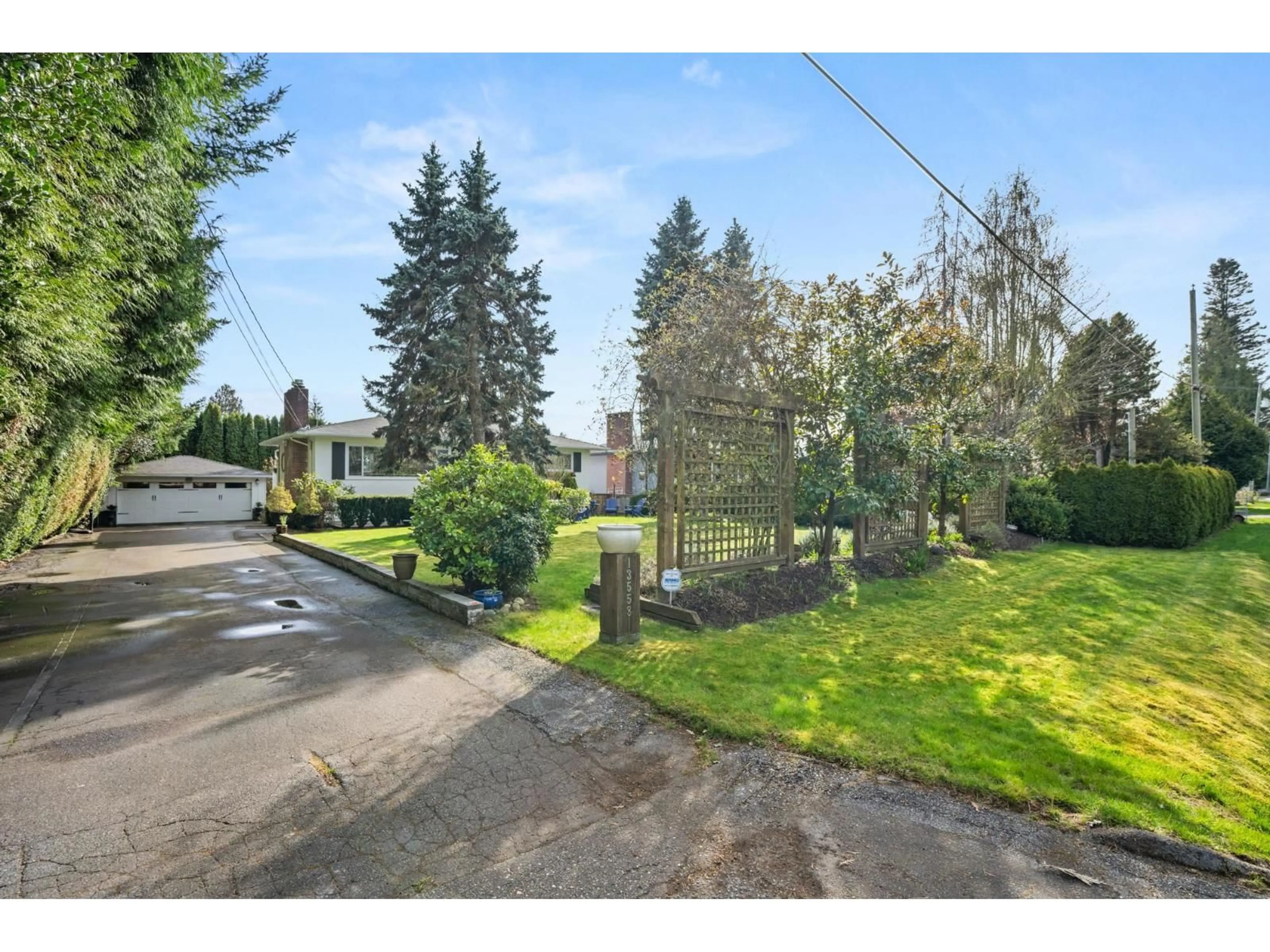 A pic from outside/outdoor area/front of a property/back of a property/a pic from drone, street for 13558 15 AVENUE, Surrey British Columbia V4A1L2