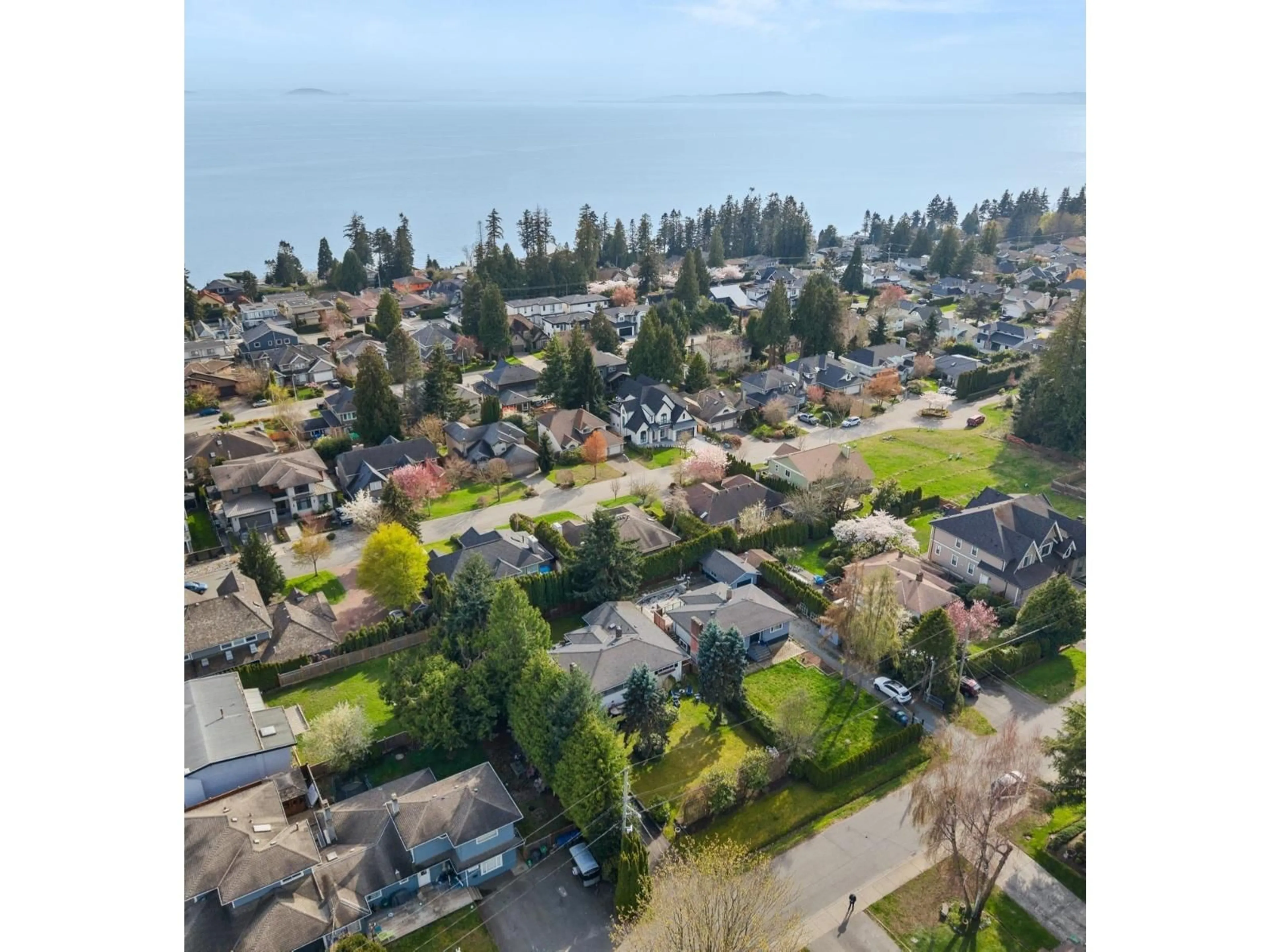 A pic from outside/outdoor area/front of a property/back of a property/a pic from drone, water/lake/river/ocean view for 13558 15 AVENUE, Surrey British Columbia V4A1L2