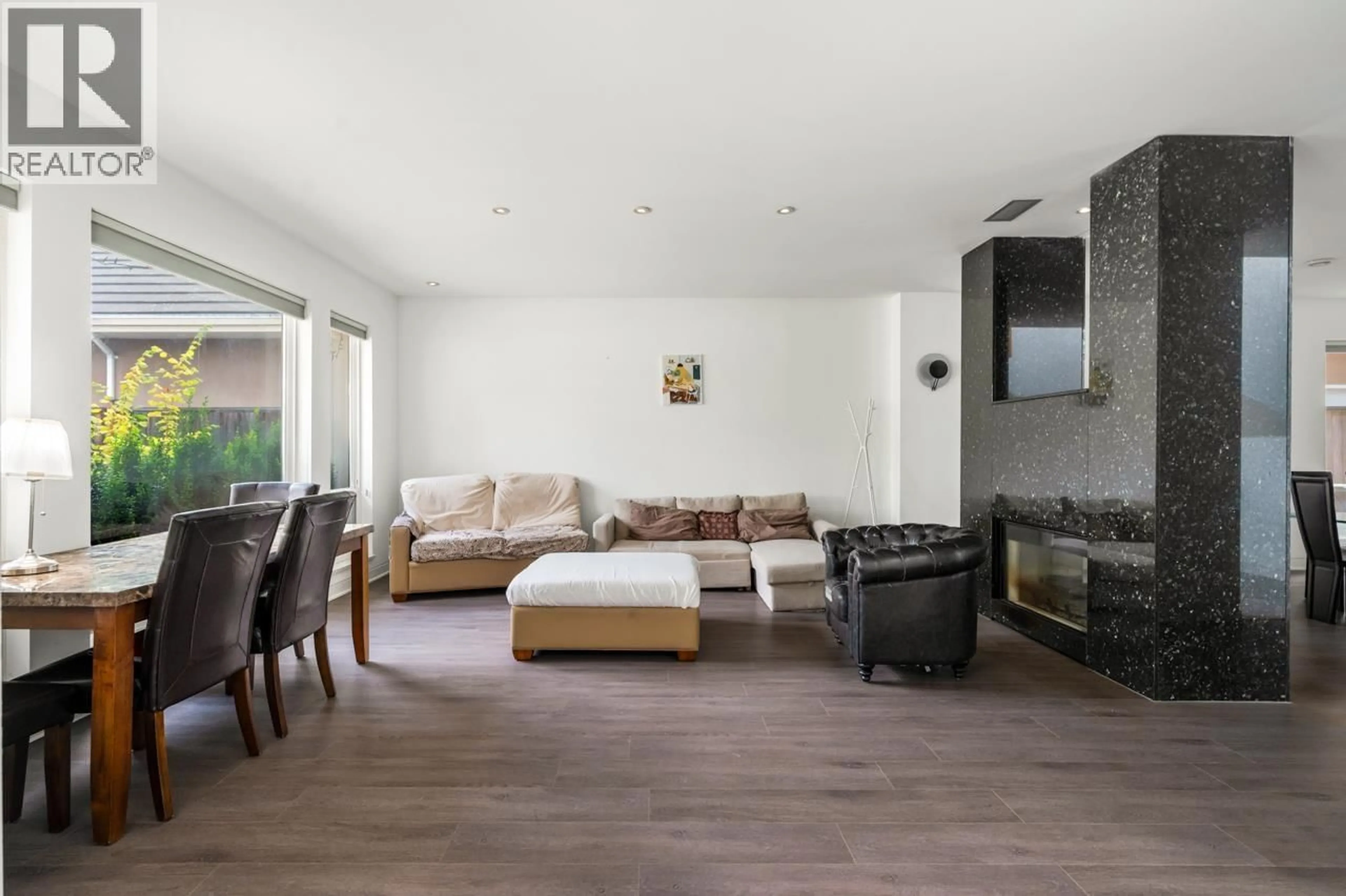 Living room with furniture, wood/laminate floor for 6840 DONALD ROAD, Richmond British Columbia V7C2Y9