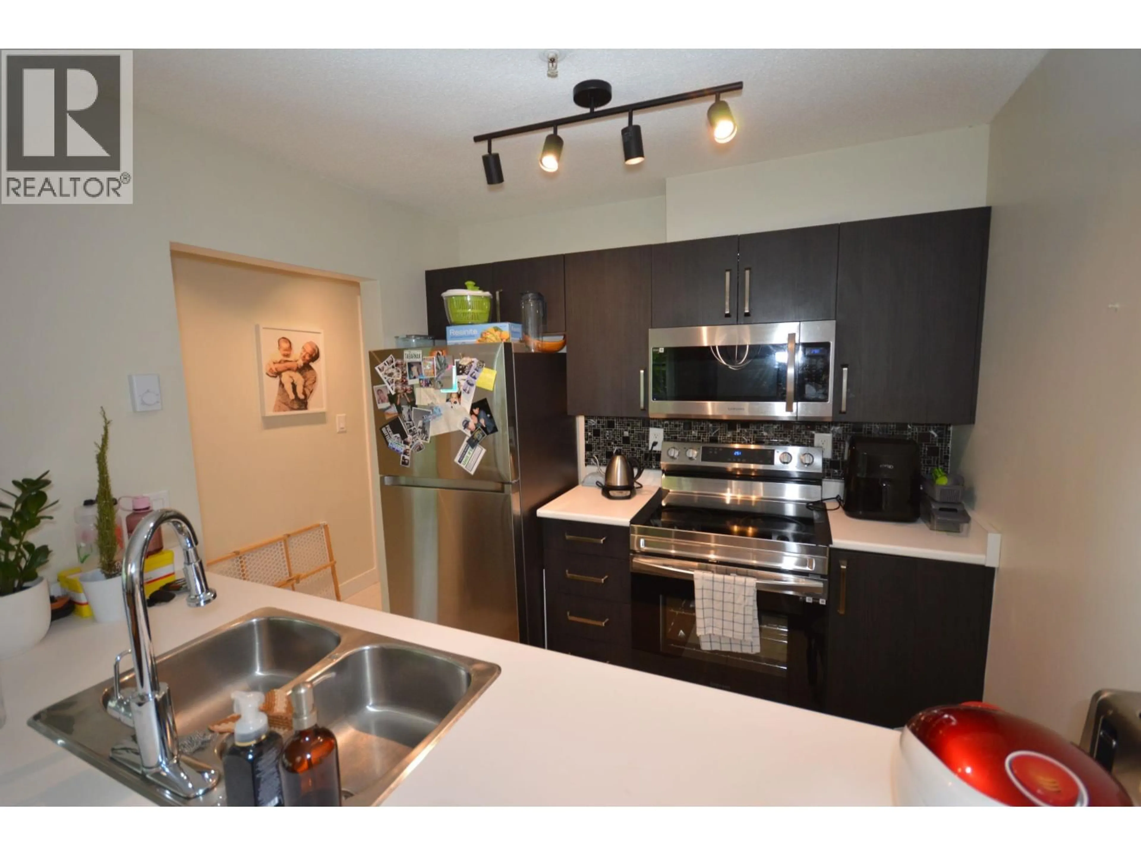 Open concept kitchen, unknown for 104 - 1166 6TH AVENUE, Vancouver British Columbia V6H1A4