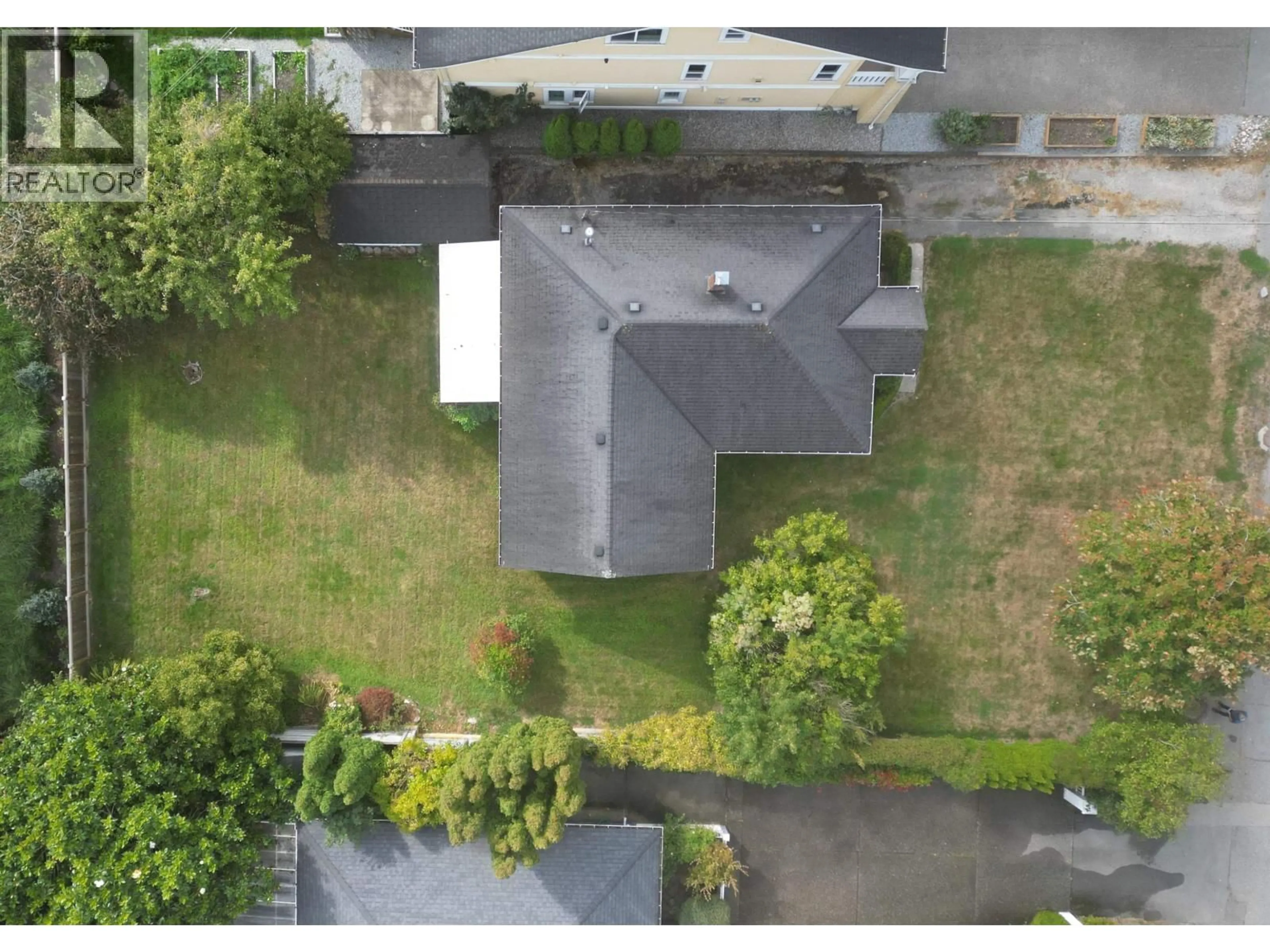 A pic from outside/outdoor area/front of a property/back of a property/a pic from drone, street for 4654 51 STREET, Delta British Columbia V4K2V7