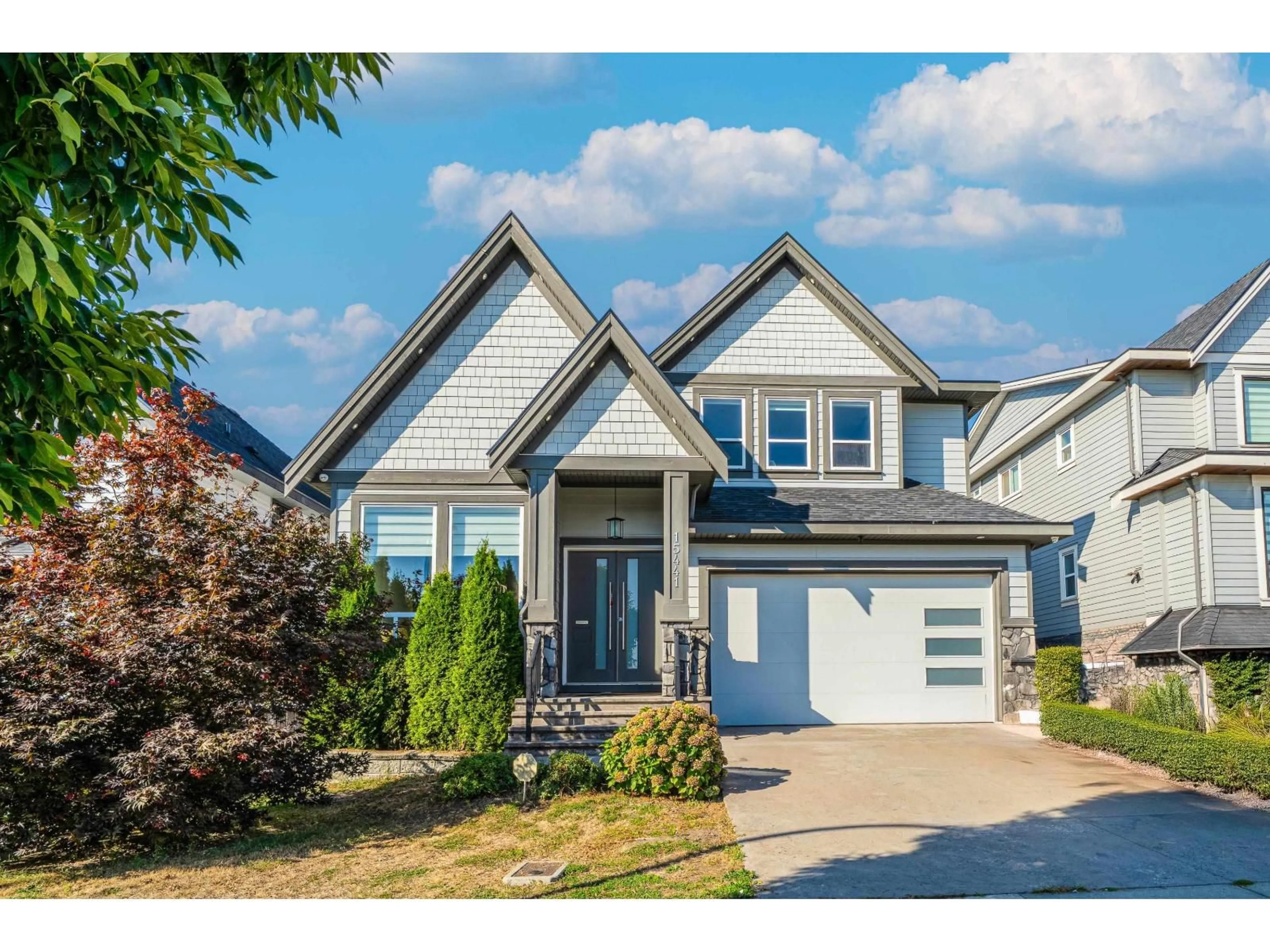Home with vinyl exterior material, street for 15441 76B, Surrey British Columbia V3S1C2