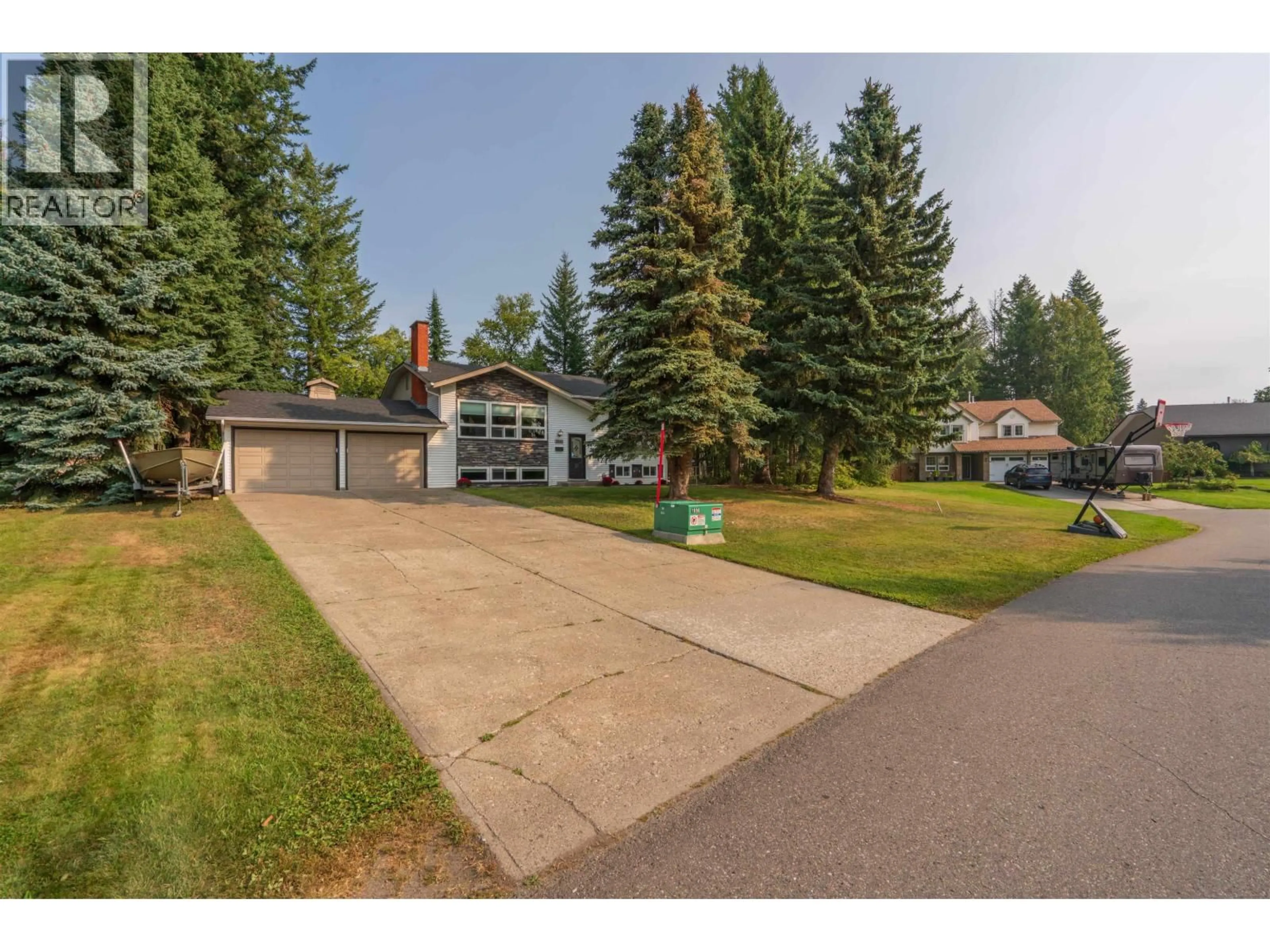 A pic from outside/outdoor area/front of a property/back of a property/a pic from drone, street for 2840 MCKENNEY CRESCENT, Prince George British Columbia V2K3X9