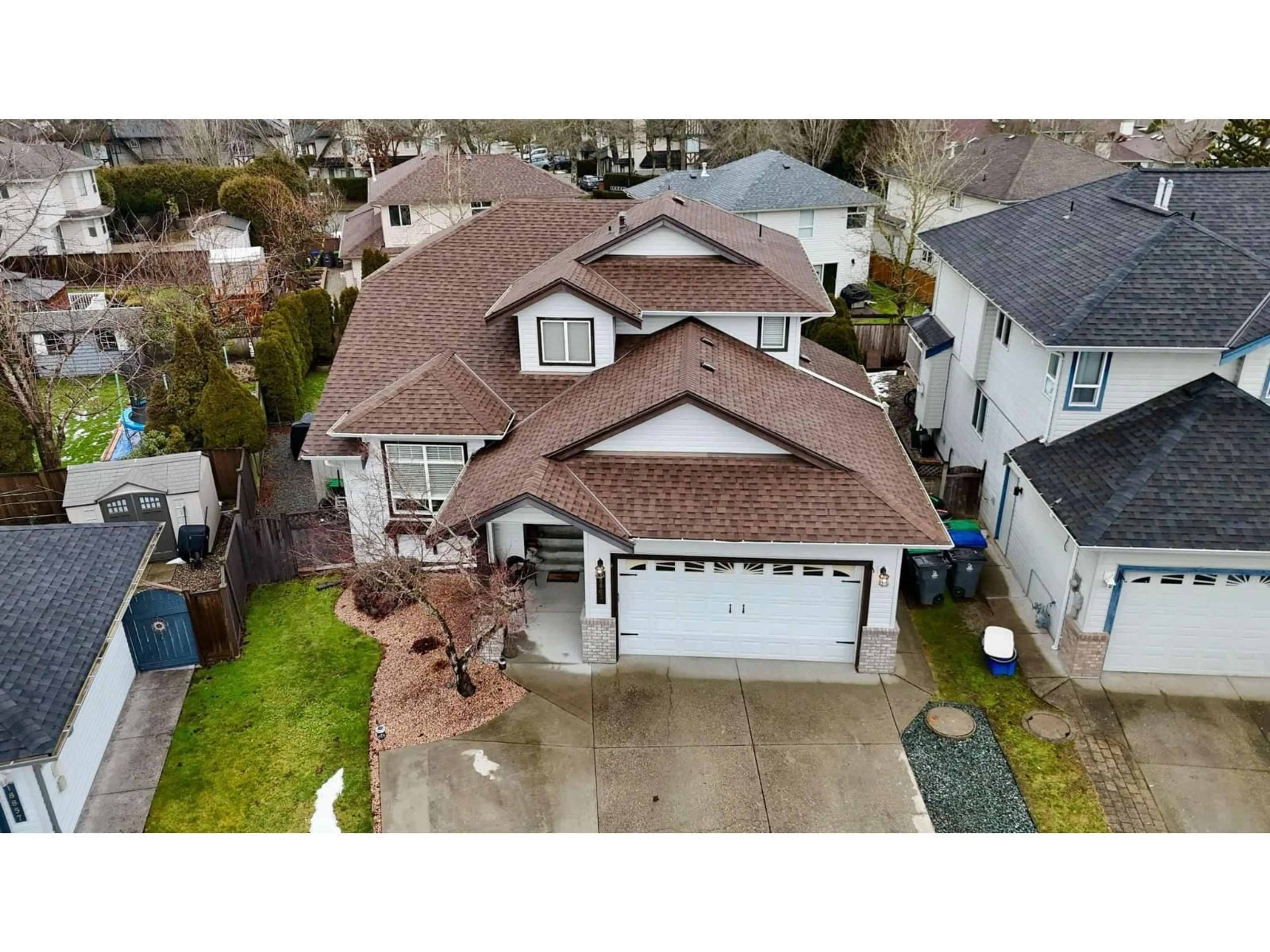 A pic from outside/outdoor area/front of a property/back of a property/a pic from drone, street for 18863 64A, Surrey British Columbia V3S8V3
