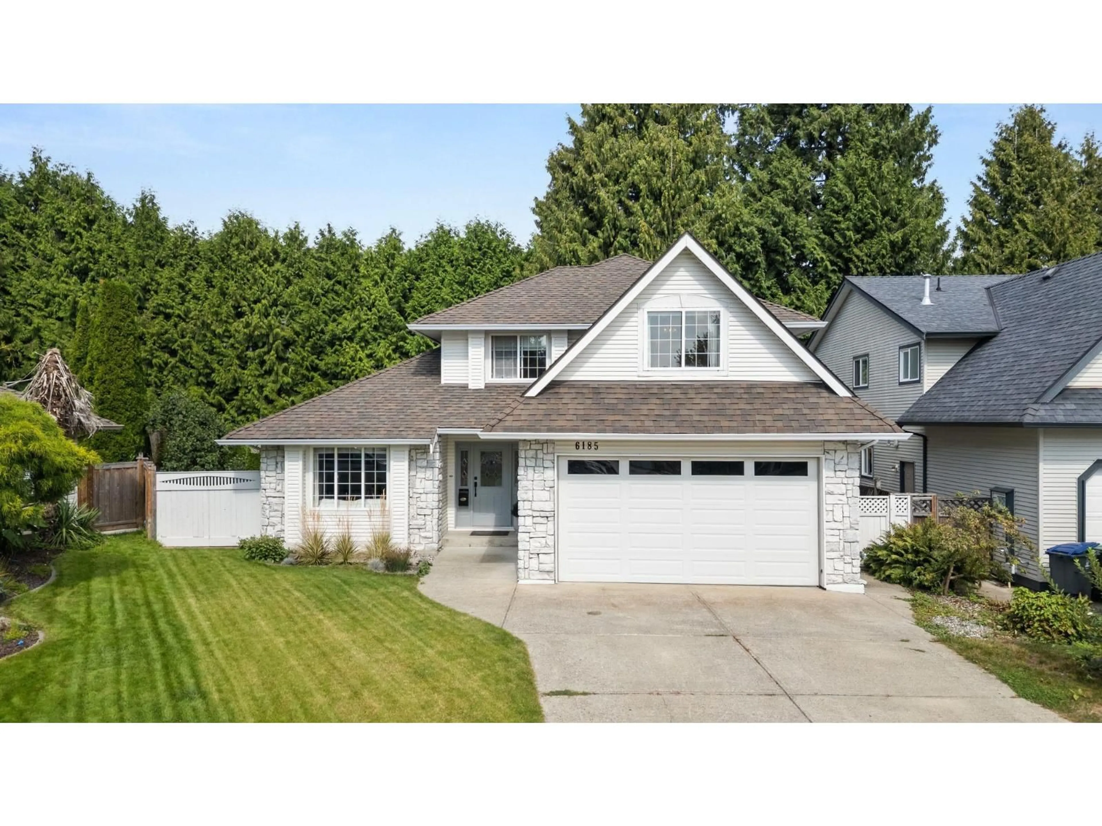Home with vinyl exterior material, street for 6185 170A, Surrey British Columbia V3S8G9