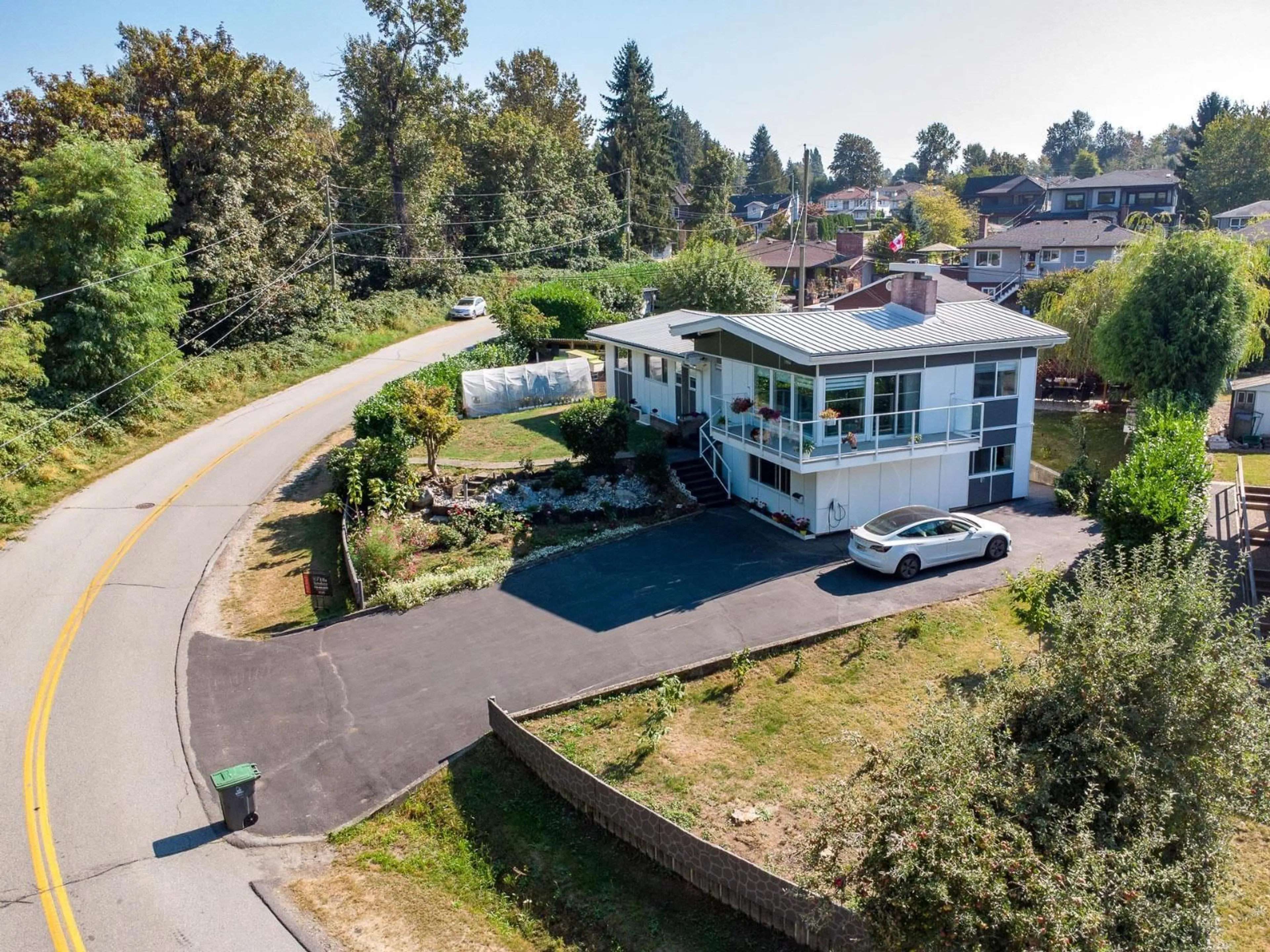 A pic from outside/outdoor area/front of a property/back of a property/a pic from drone, street for 11906 100, Surrey British Columbia V3V2W1