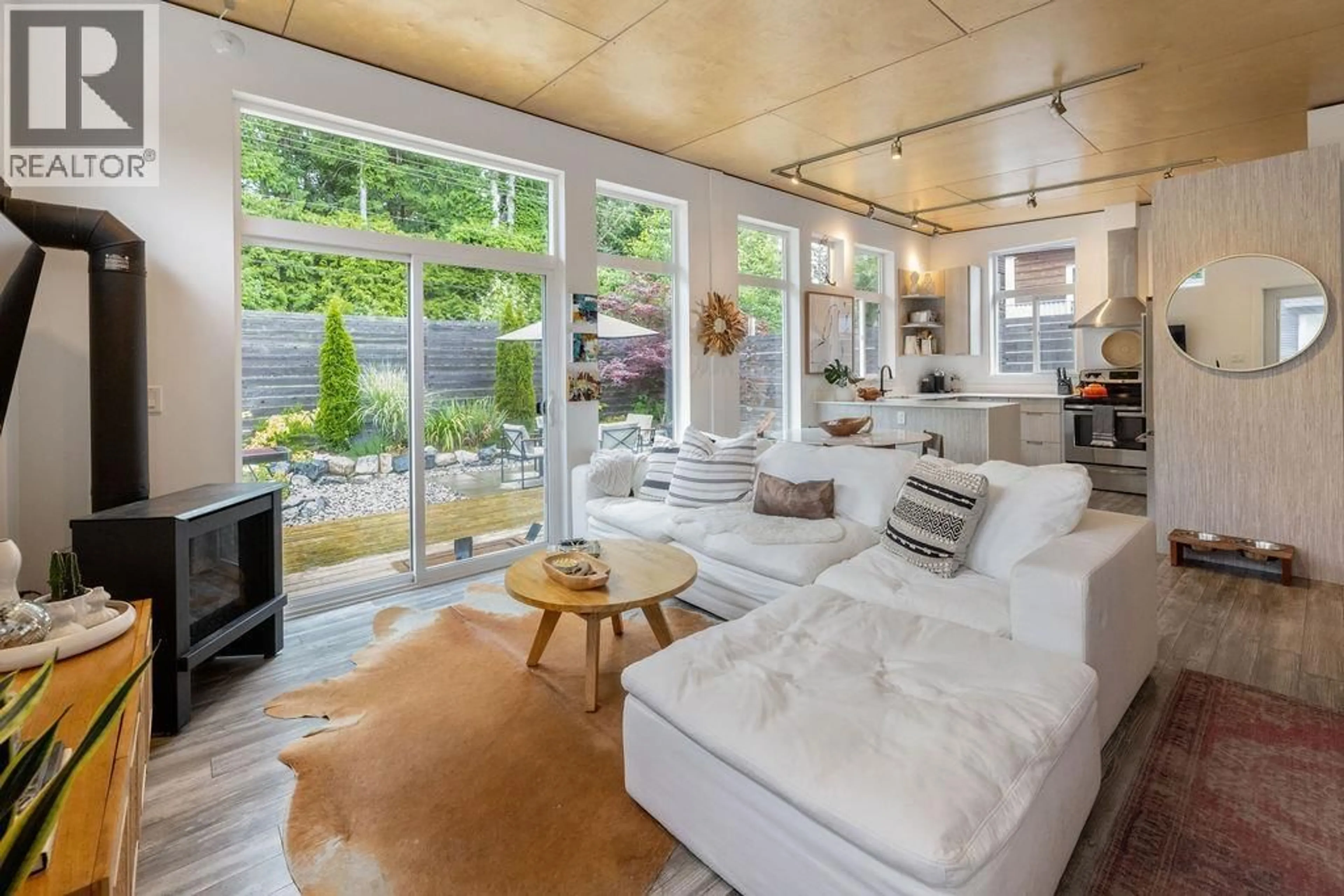 Living room with furniture, unknown for 890 TROWER LANE, Gibsons British Columbia V0N1V7