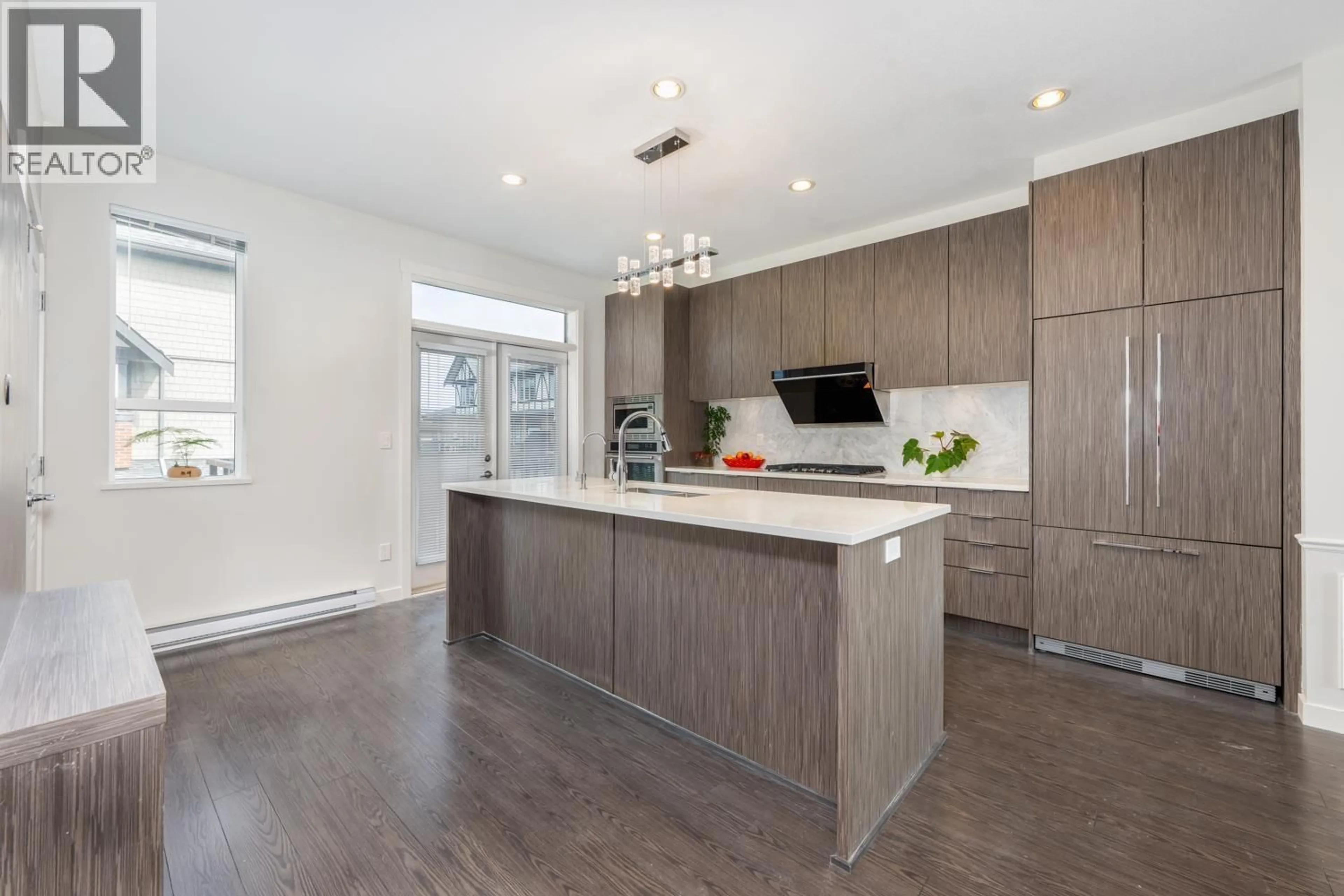 Open concept kitchen, wood/laminate floor for 91 - 10388 NO. 2 ROAD, Richmond British Columbia V7E0B9