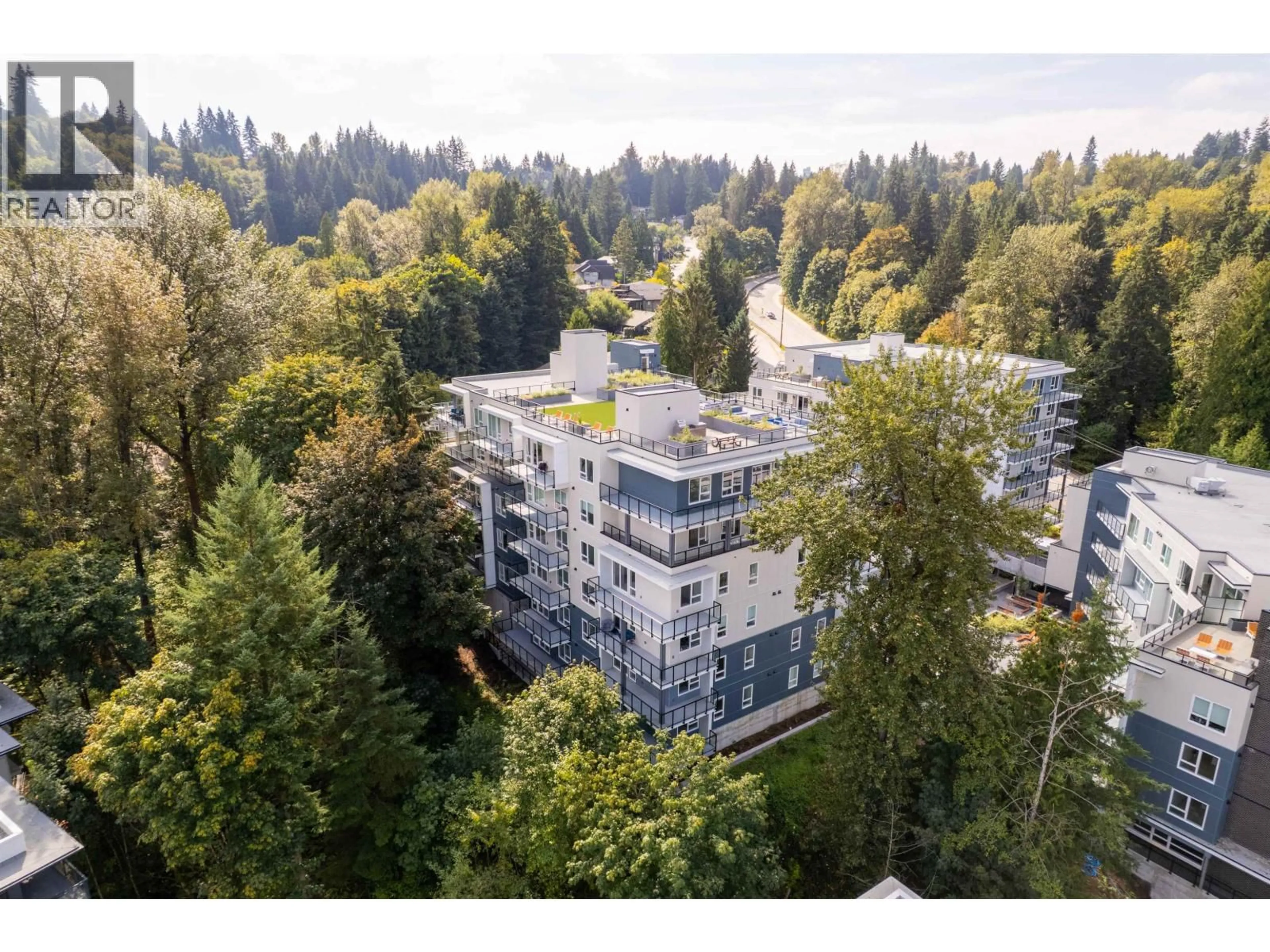 A pic from outside/outdoor area/front of a property/back of a property/a pic from drone, forest/trees view for 511 - 2002 ST. GEORGE STREET, Port Moody British Columbia V3H2E6