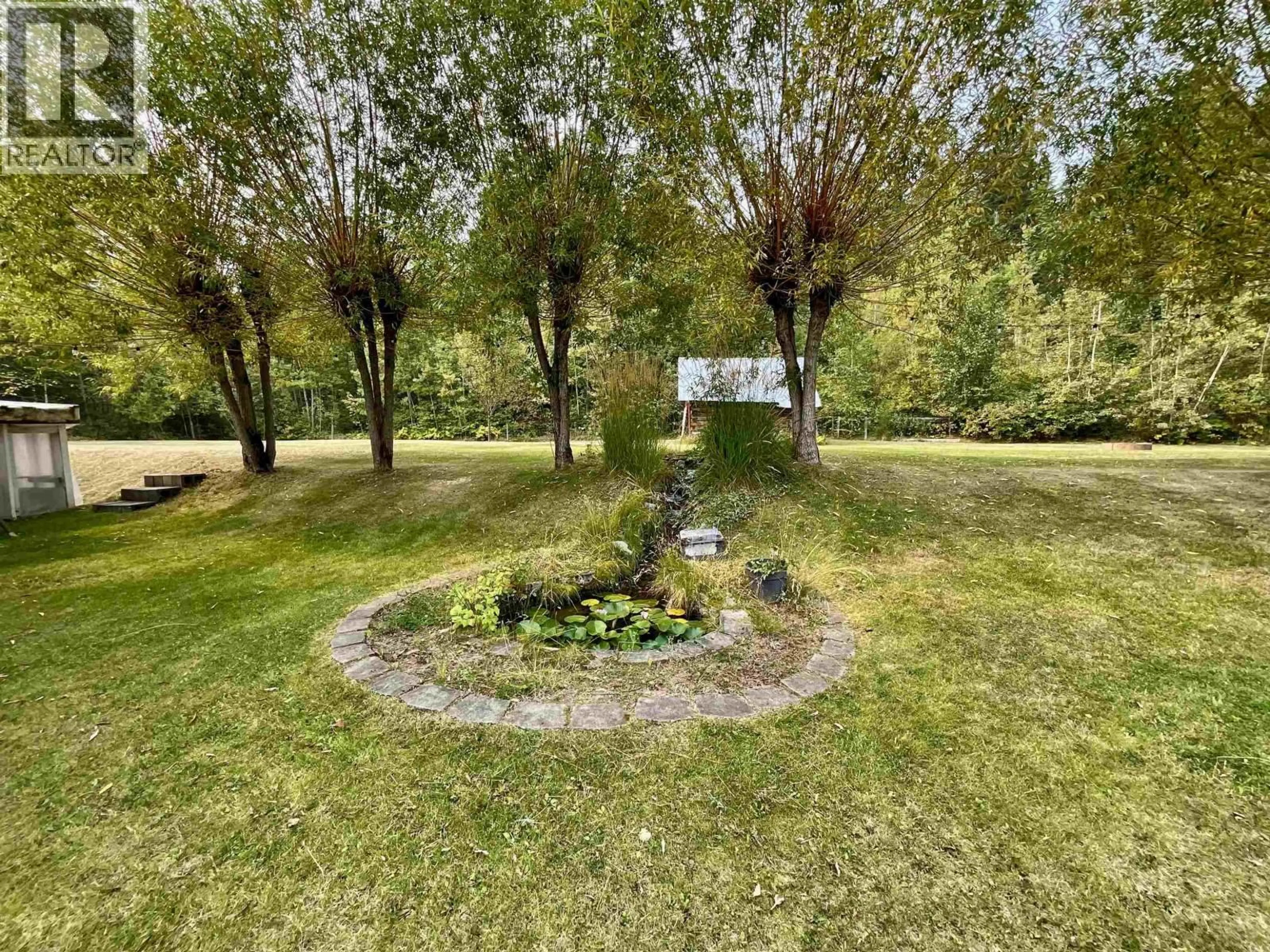 A pic from outside/outdoor area/front of a property/back of a property/a pic from drone, forest/trees view for 1880 ALMA ROAD, Quesnel British Columbia V2J6J3