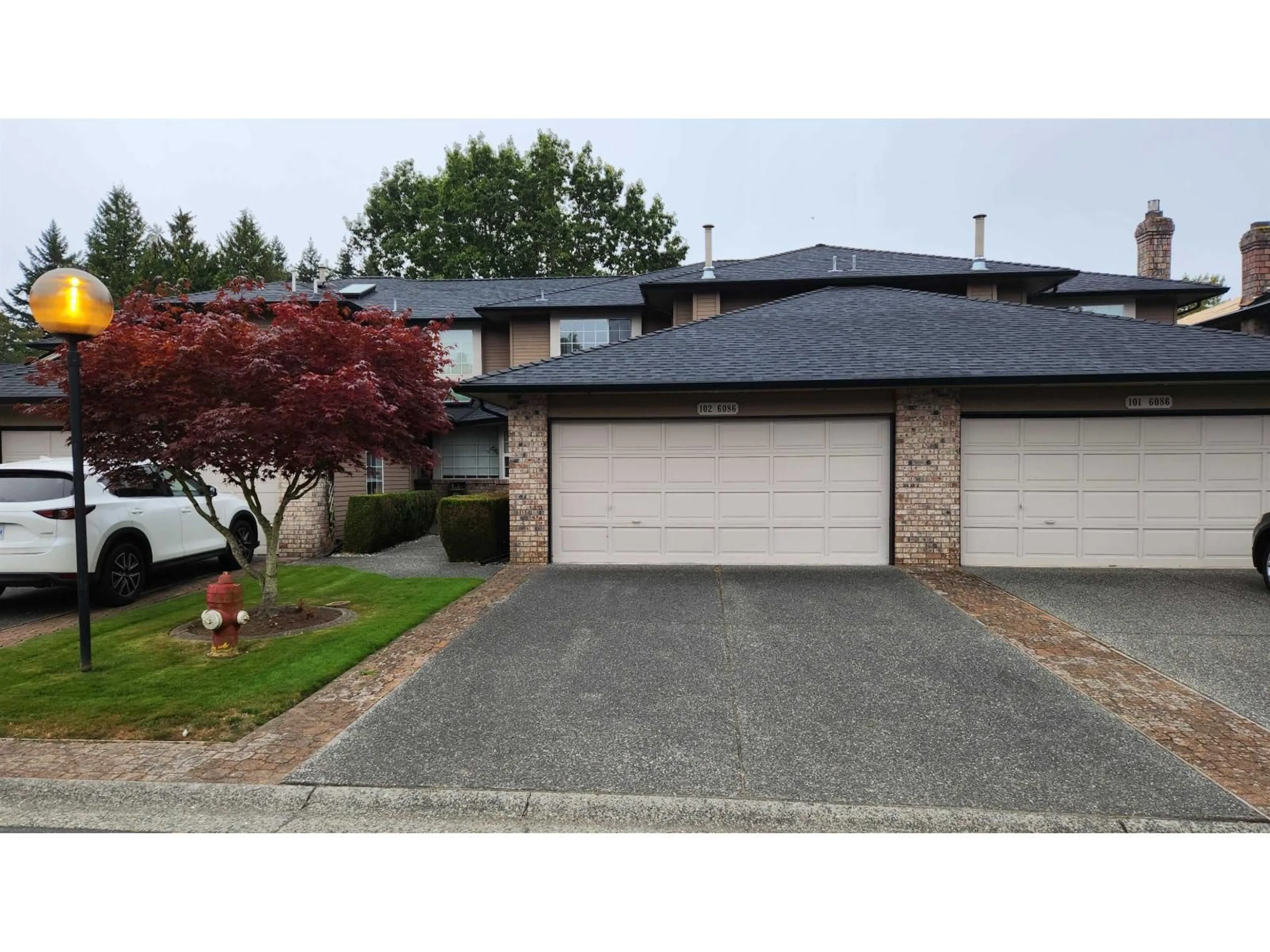 A pic from outside/outdoor area/front of a property/back of a property/a pic from drone, street for 102 - 6086 BOUNDARY WEST, Surrey British Columbia V3X2B3