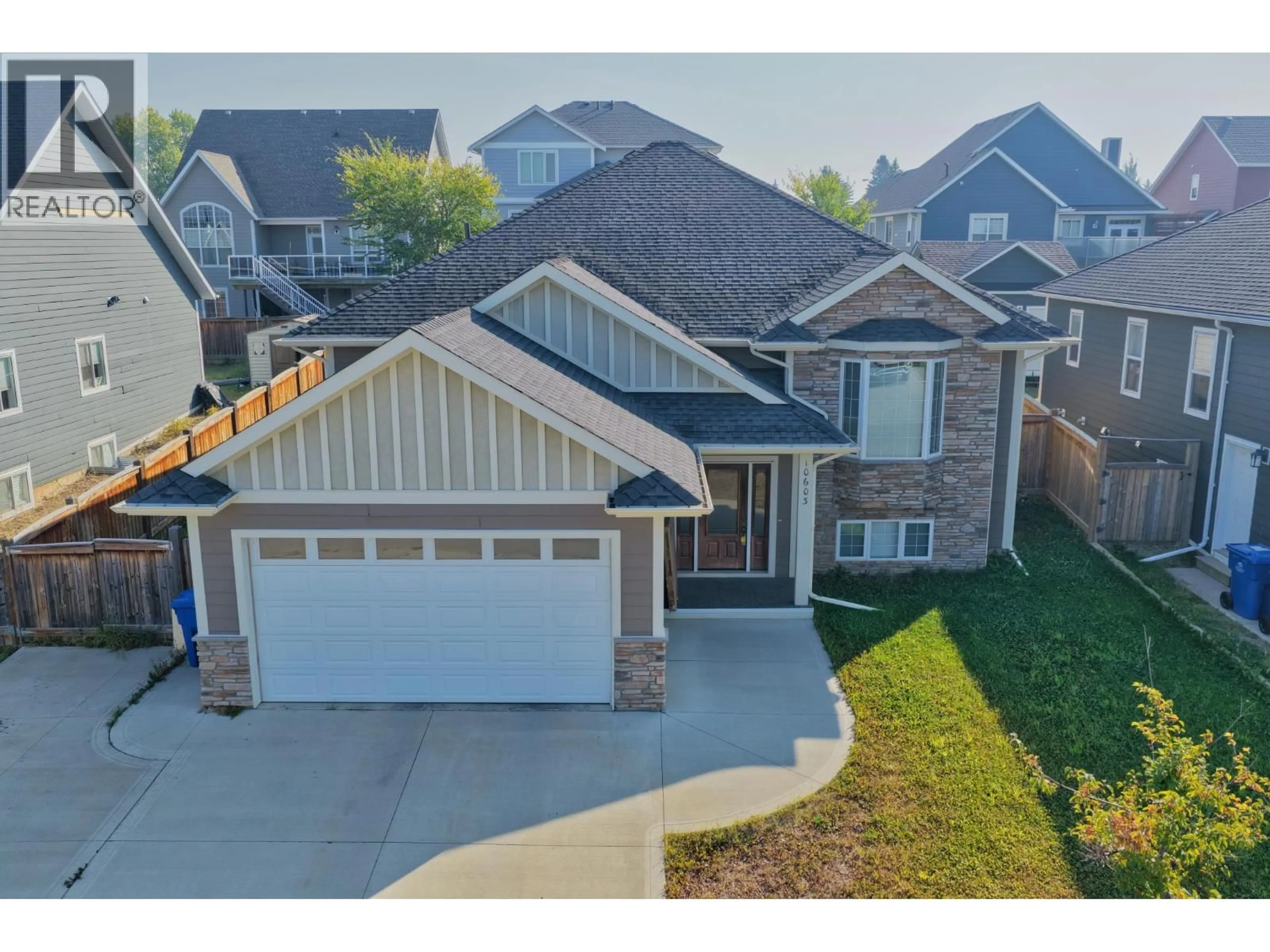 A pic from outside/outdoor area/front of a property/back of a property/a pic from drone, street for 10603 109 STREET, Fort St. John British Columbia V1J0J3