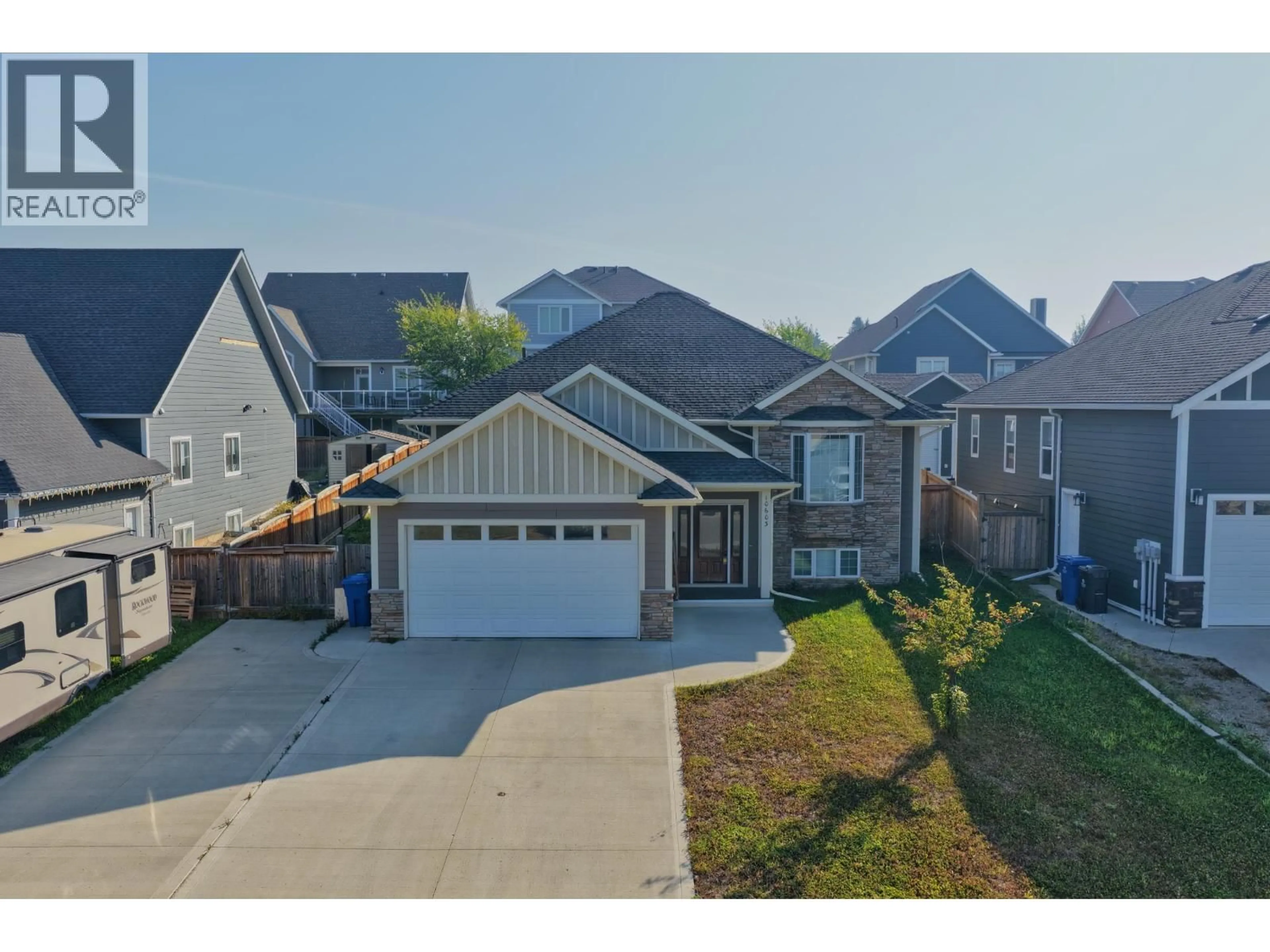 A pic from outside/outdoor area/front of a property/back of a property/a pic from drone, street for 10603 109 STREET, Fort St. John British Columbia V1J0J3