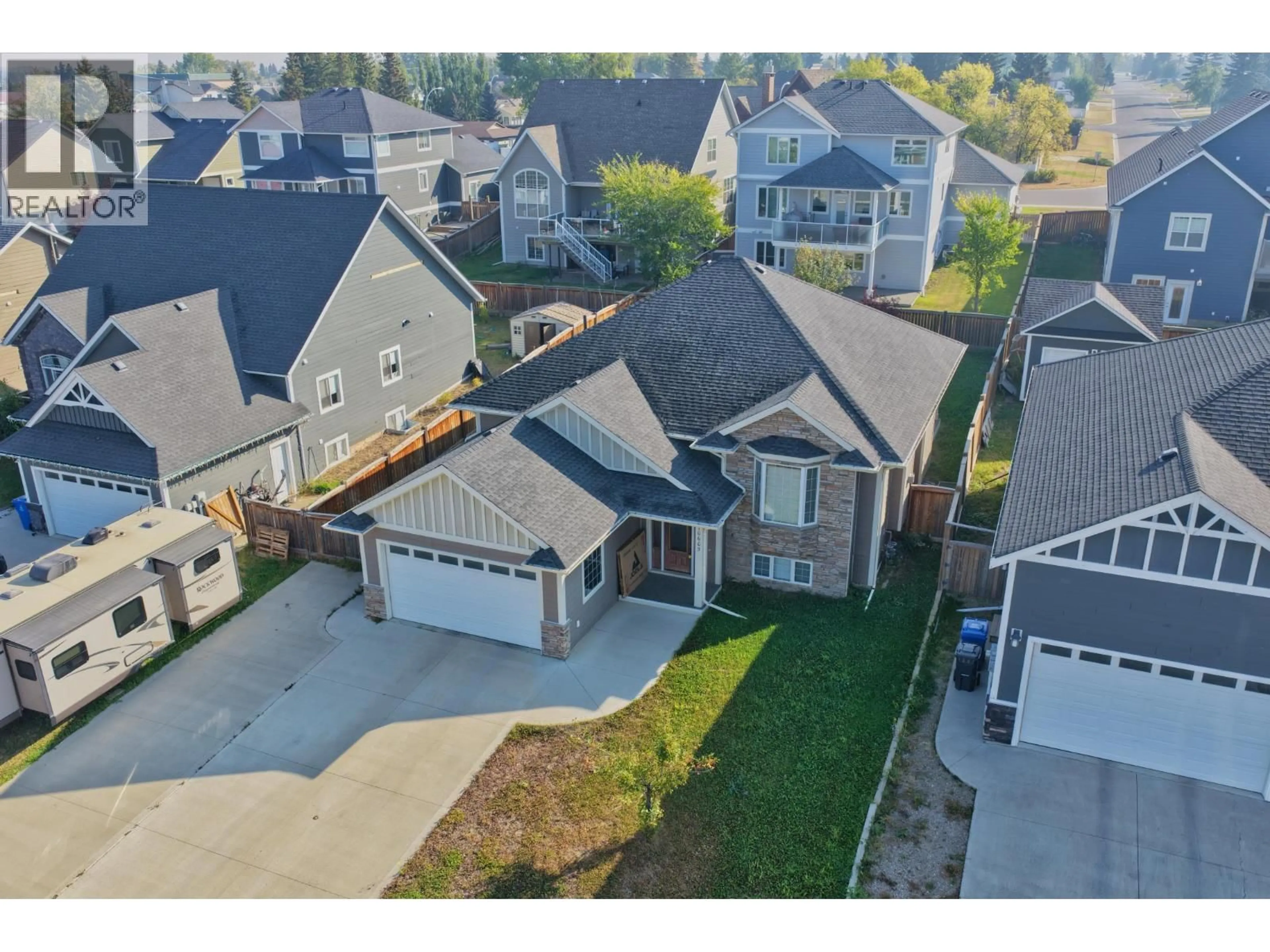 A pic from outside/outdoor area/front of a property/back of a property/a pic from drone, street for 10603 109 STREET, Fort St. John British Columbia V1J0J3