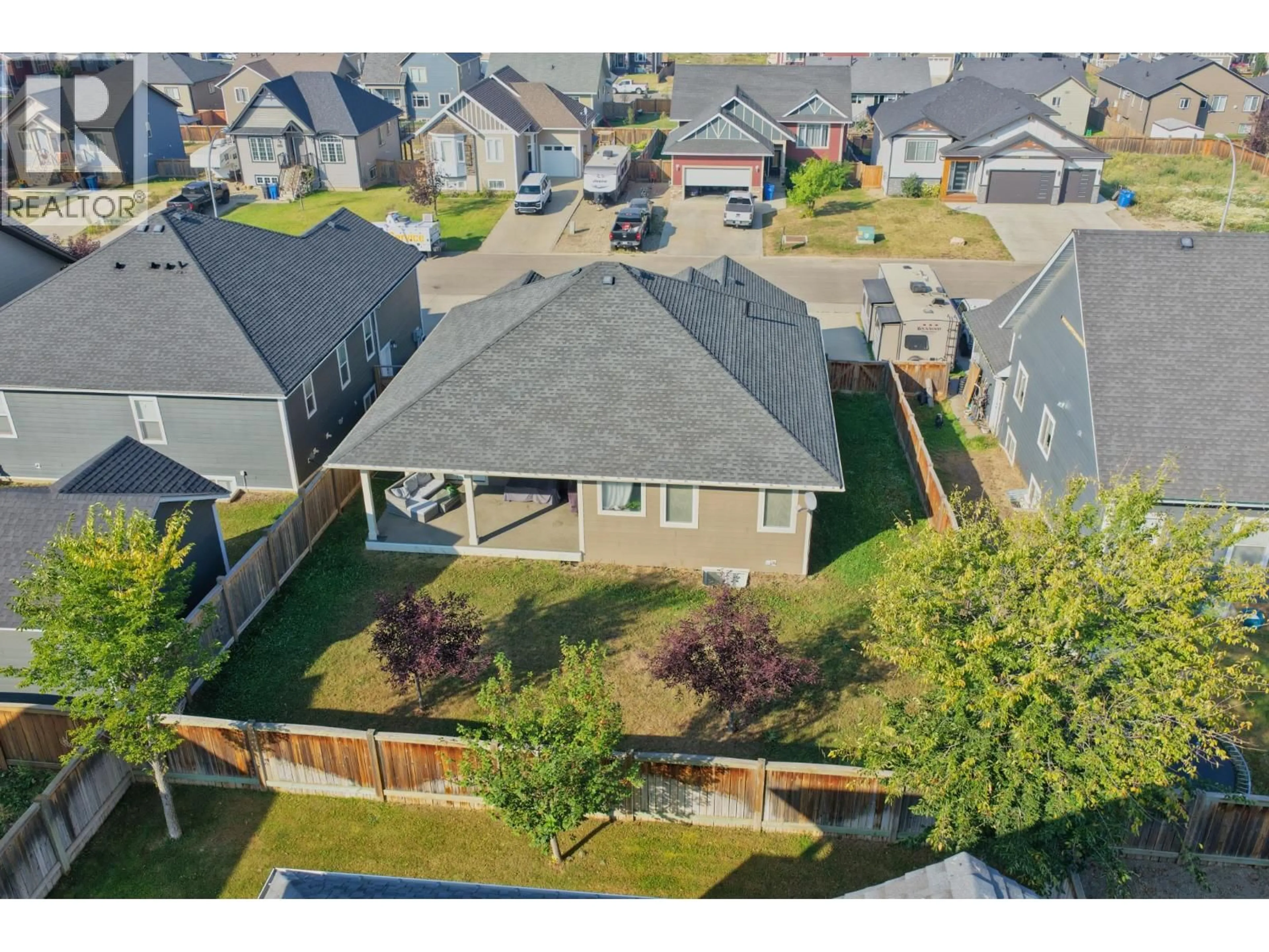 A pic from outside/outdoor area/front of a property/back of a property/a pic from drone, unknown for 10603 109 STREET, Fort St. John British Columbia V1J0J3