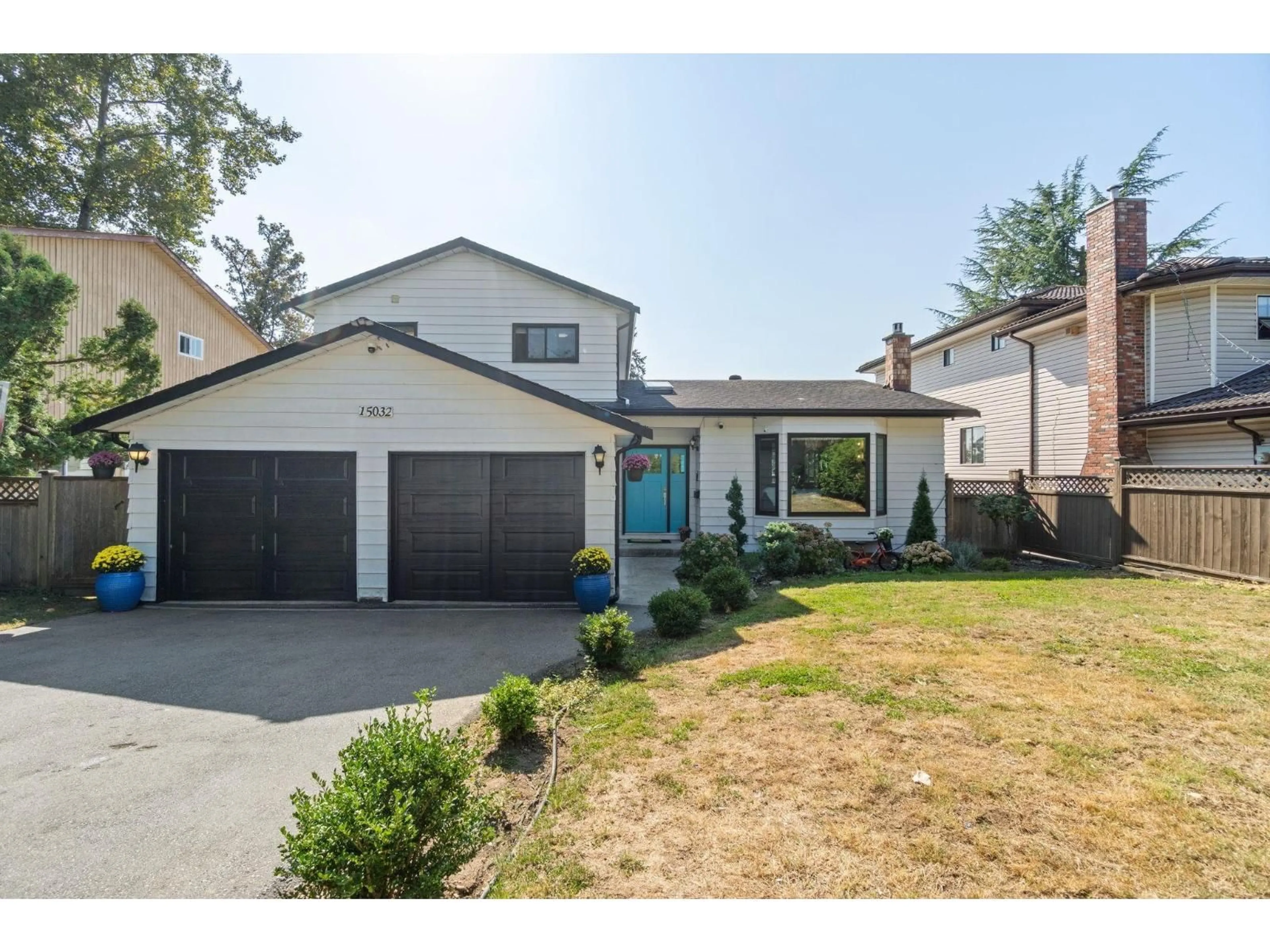 Home with vinyl exterior material, street for 15032 SPENSER, Surrey British Columbia V3S5Z7