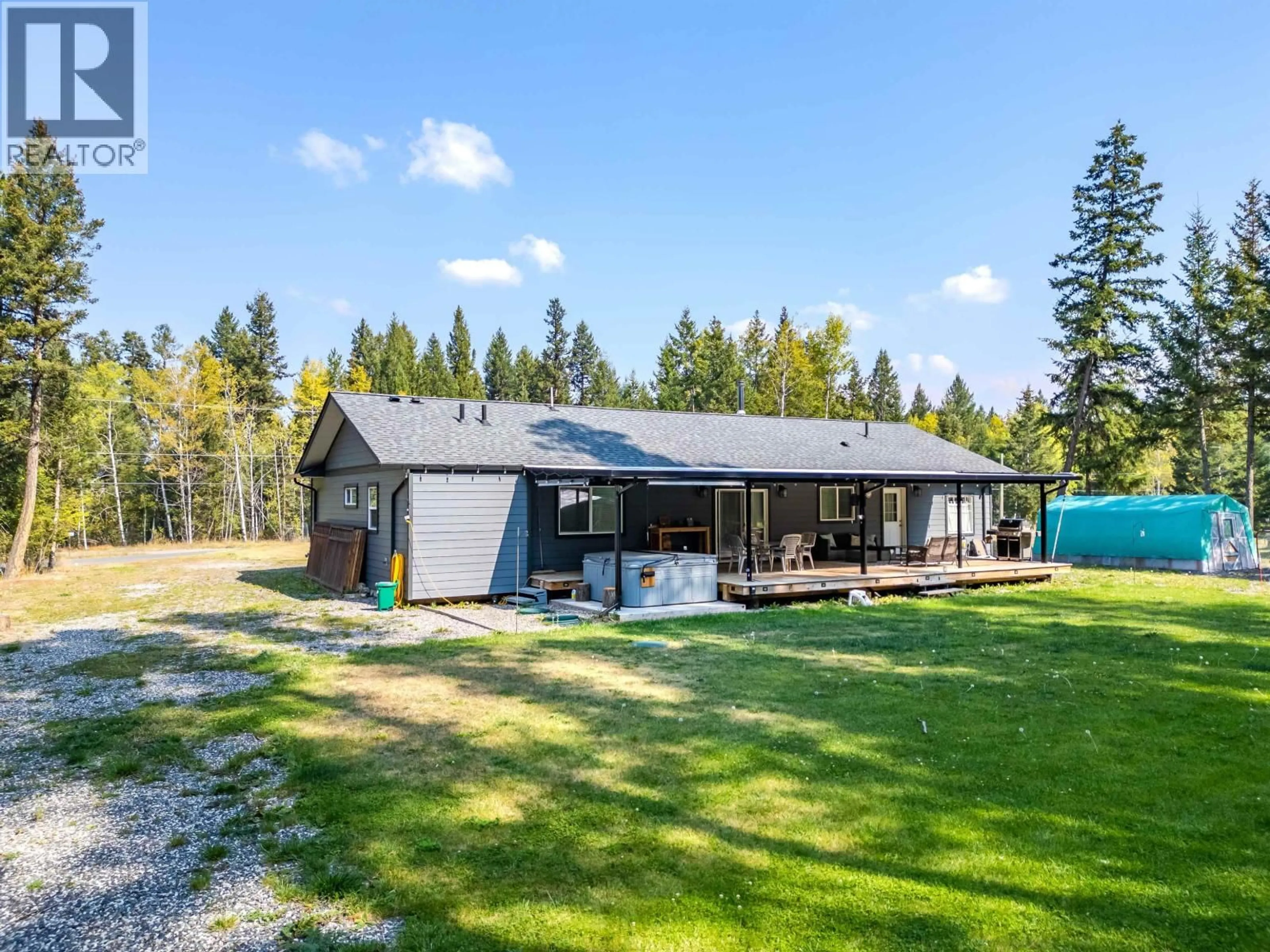A pic from outside/outdoor area/front of a property/back of a property/a pic from drone, unknown for 5310 KALLUM DRIVE, 108 Mile Ranch British Columbia V0K2Z0