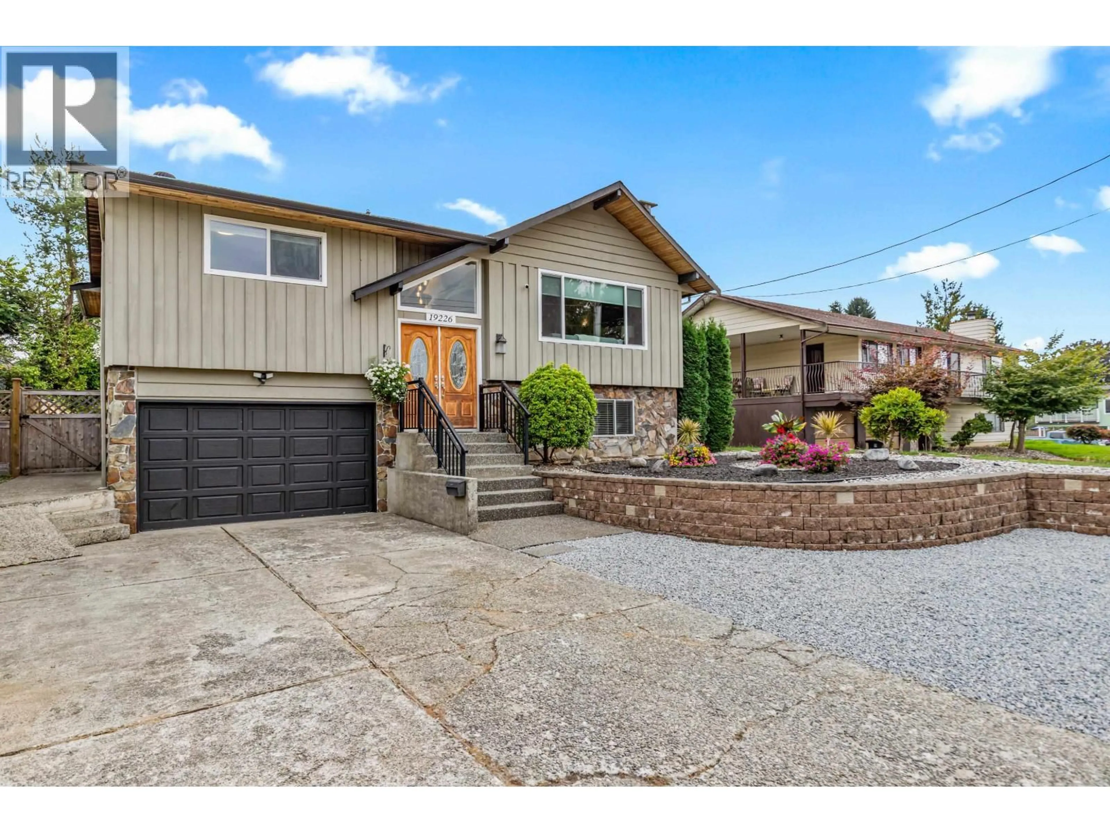 Home with vinyl exterior material, street for 19226 HAMMOND ROAD, Pitt Meadows British Columbia V3Y1C1