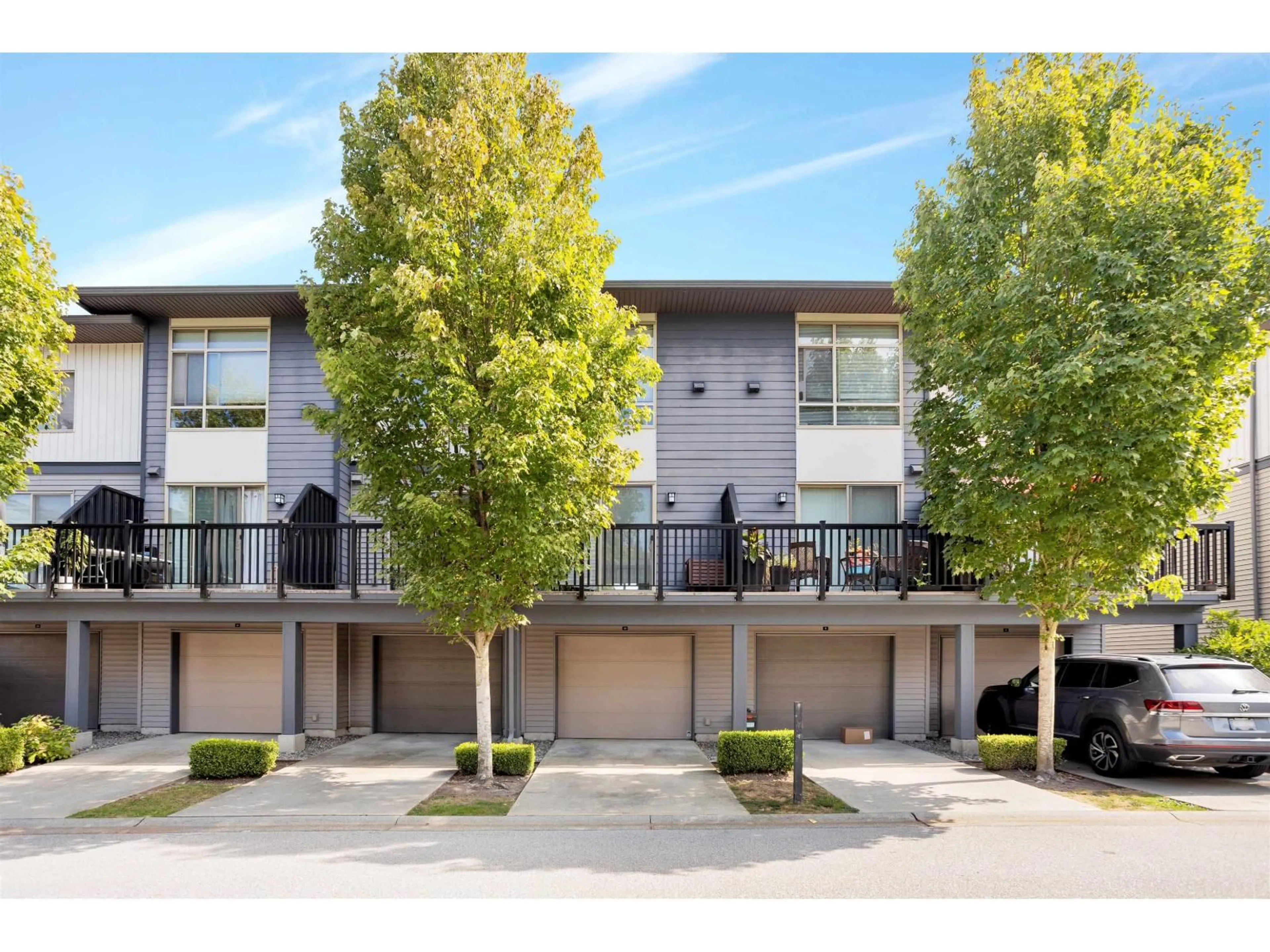 A pic from outside/outdoor area/front of a property/back of a property/a pic from drone, street for 10 - 8473 163, Surrey British Columbia V4N6M7