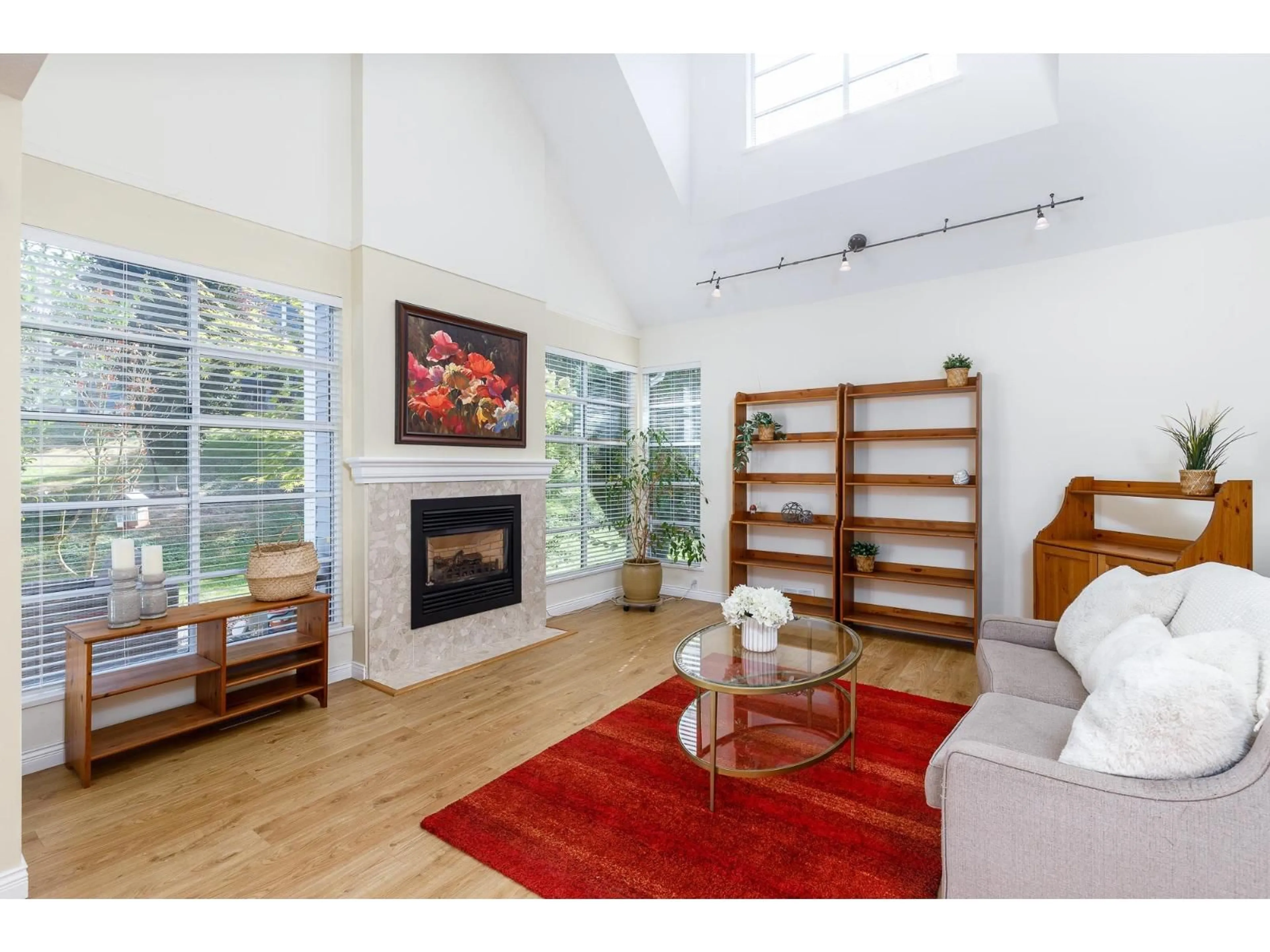 Living room with furniture, wood/laminate floor for 42 - 4847 219, Langley British Columbia V3A8C1