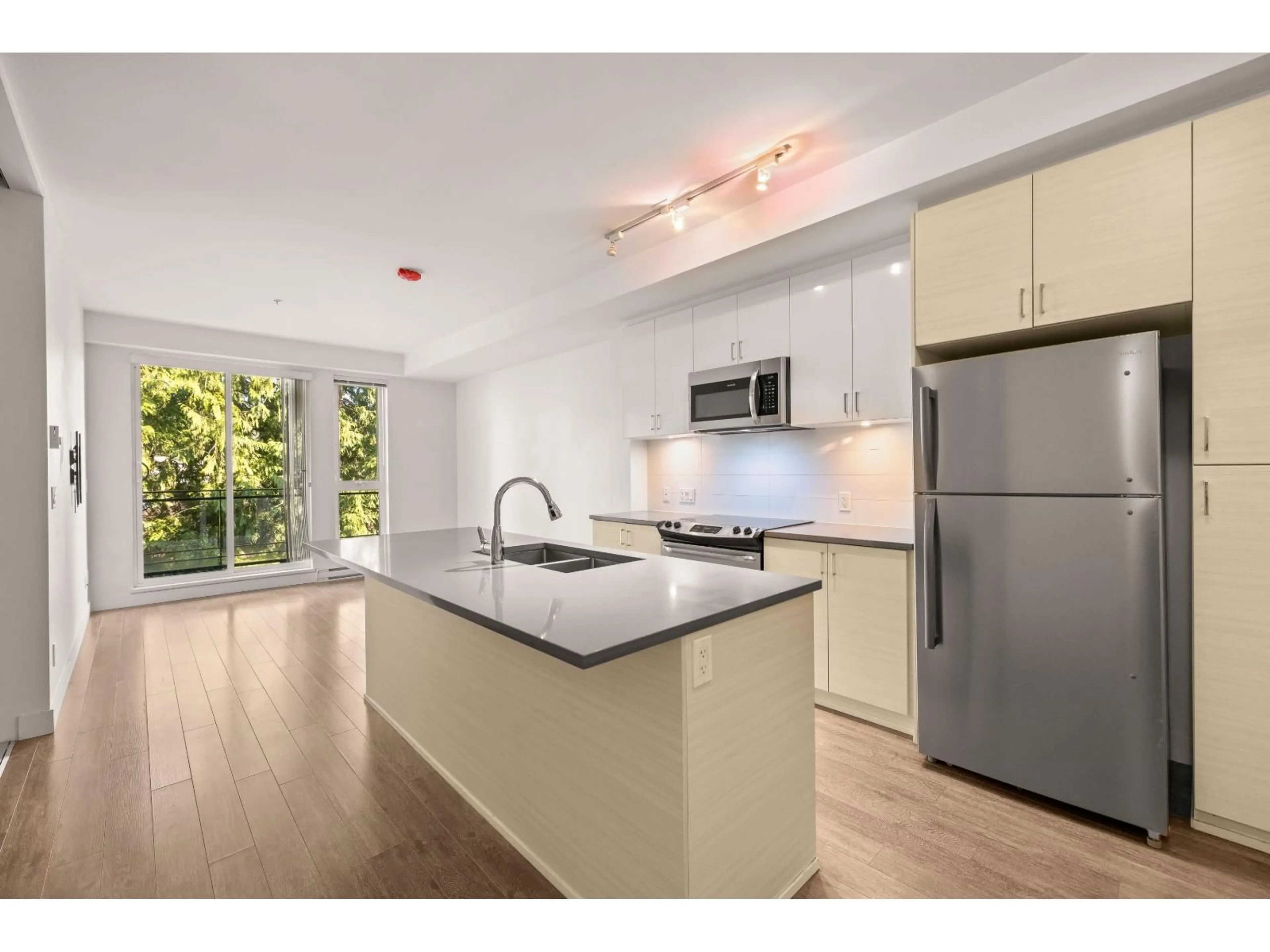 Open concept kitchen, unknown for 306 - 13919 FRASER, Surrey British Columbia V3T4E6