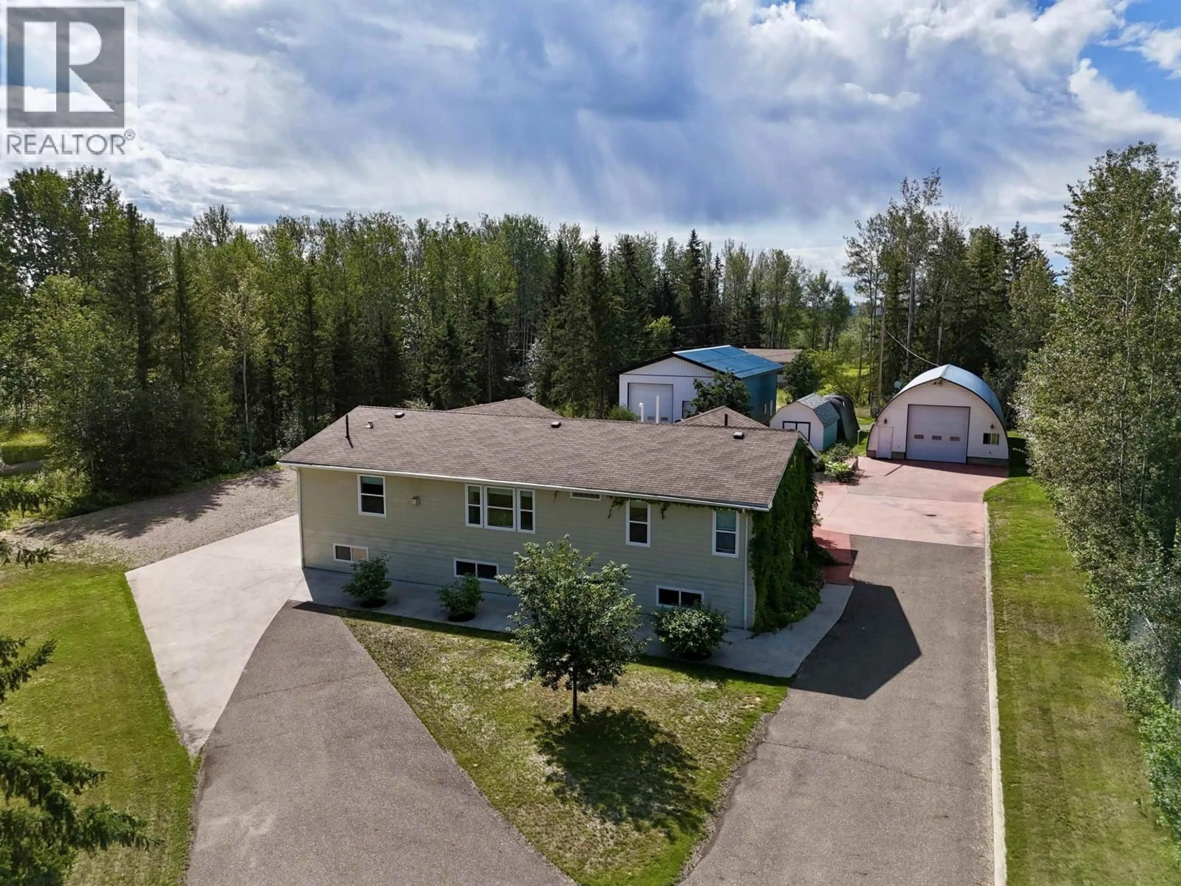 A pic from outside/outdoor area/front of a property/back of a property/a pic from drone, unknown for 4 RESERVE ROAD, Fort Nelson British Columbia V0C1R0