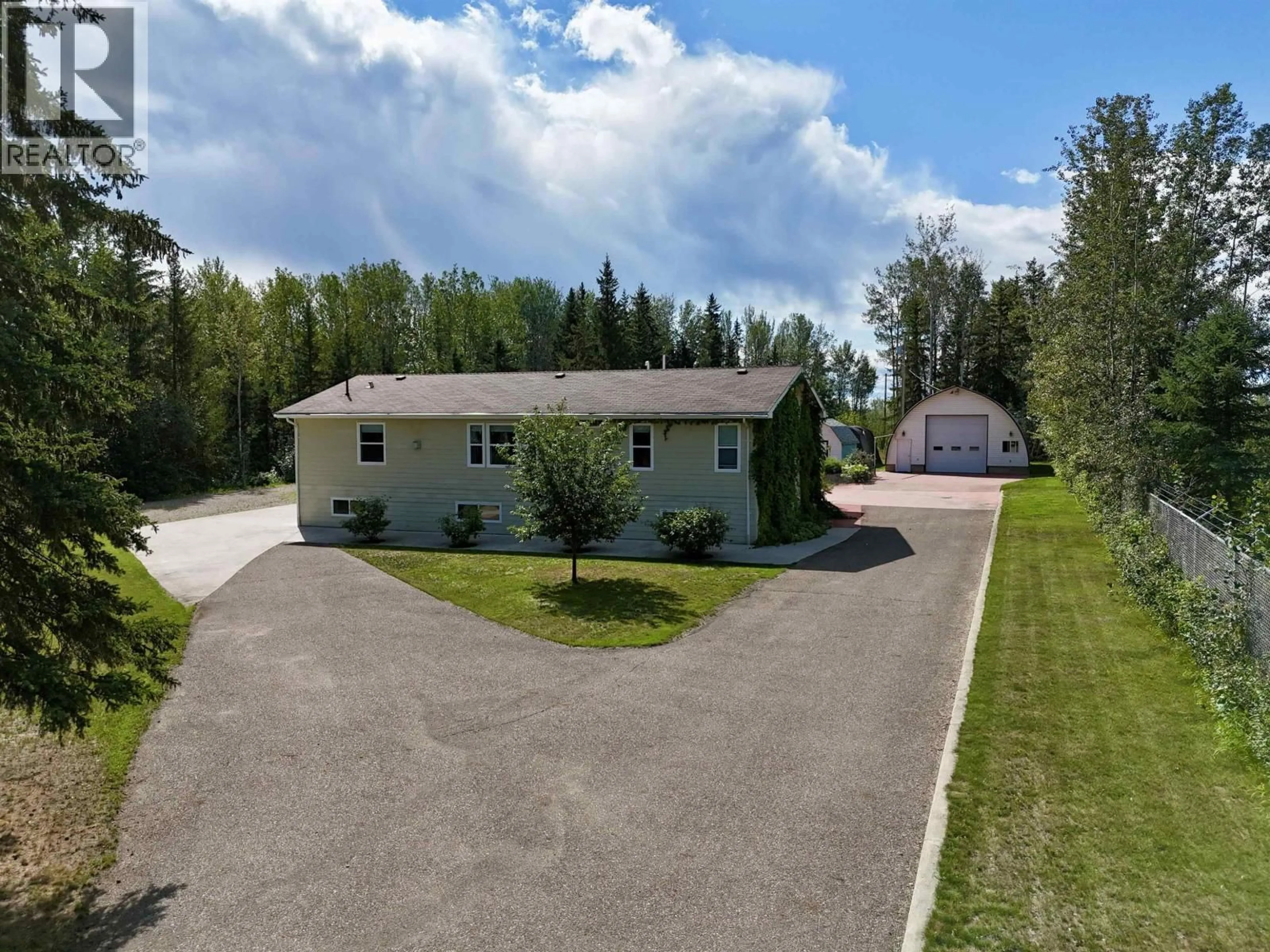 A pic from outside/outdoor area/front of a property/back of a property/a pic from drone, street for 4 RESERVE ROAD, Fort Nelson British Columbia V0C1R0