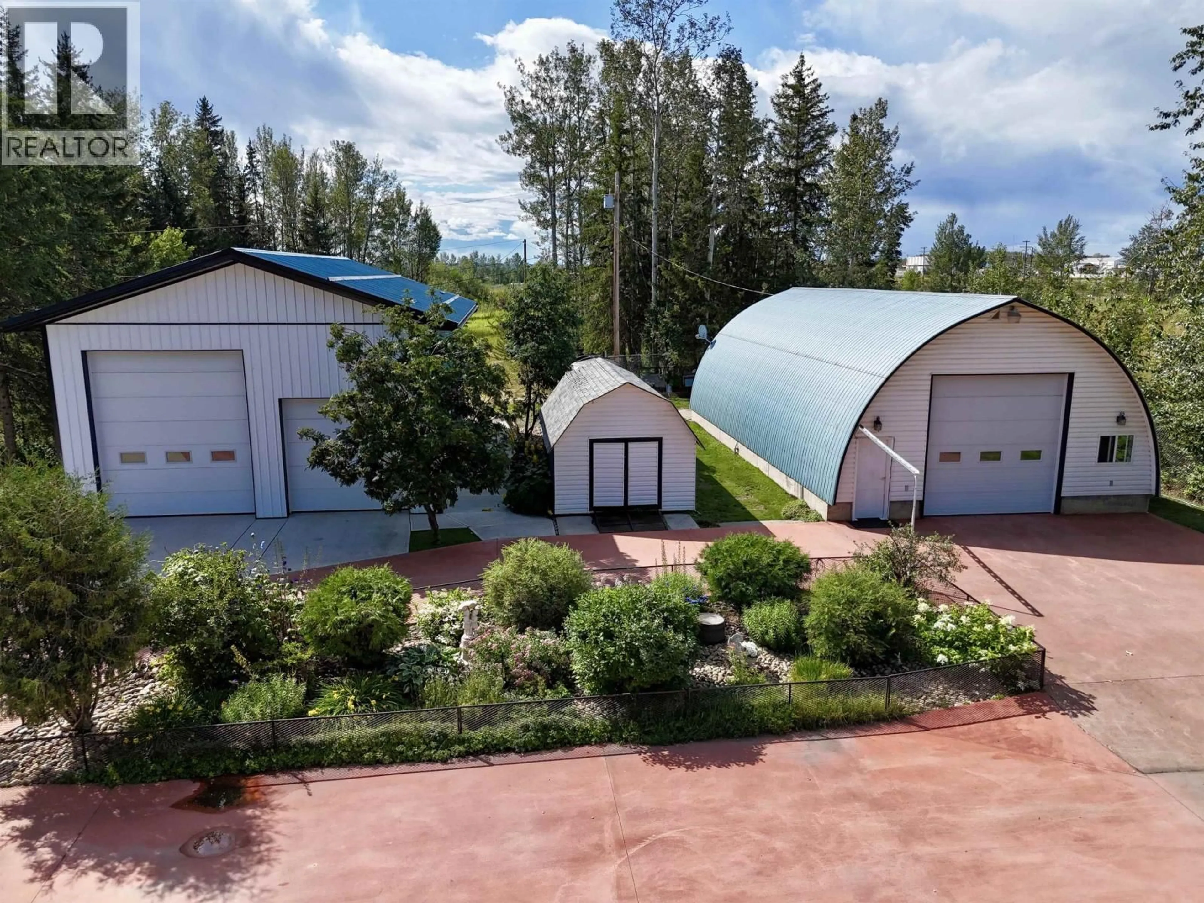 A pic from outside/outdoor area/front of a property/back of a property/a pic from drone, unknown for 4 RESERVE ROAD, Fort Nelson British Columbia V0C1R0