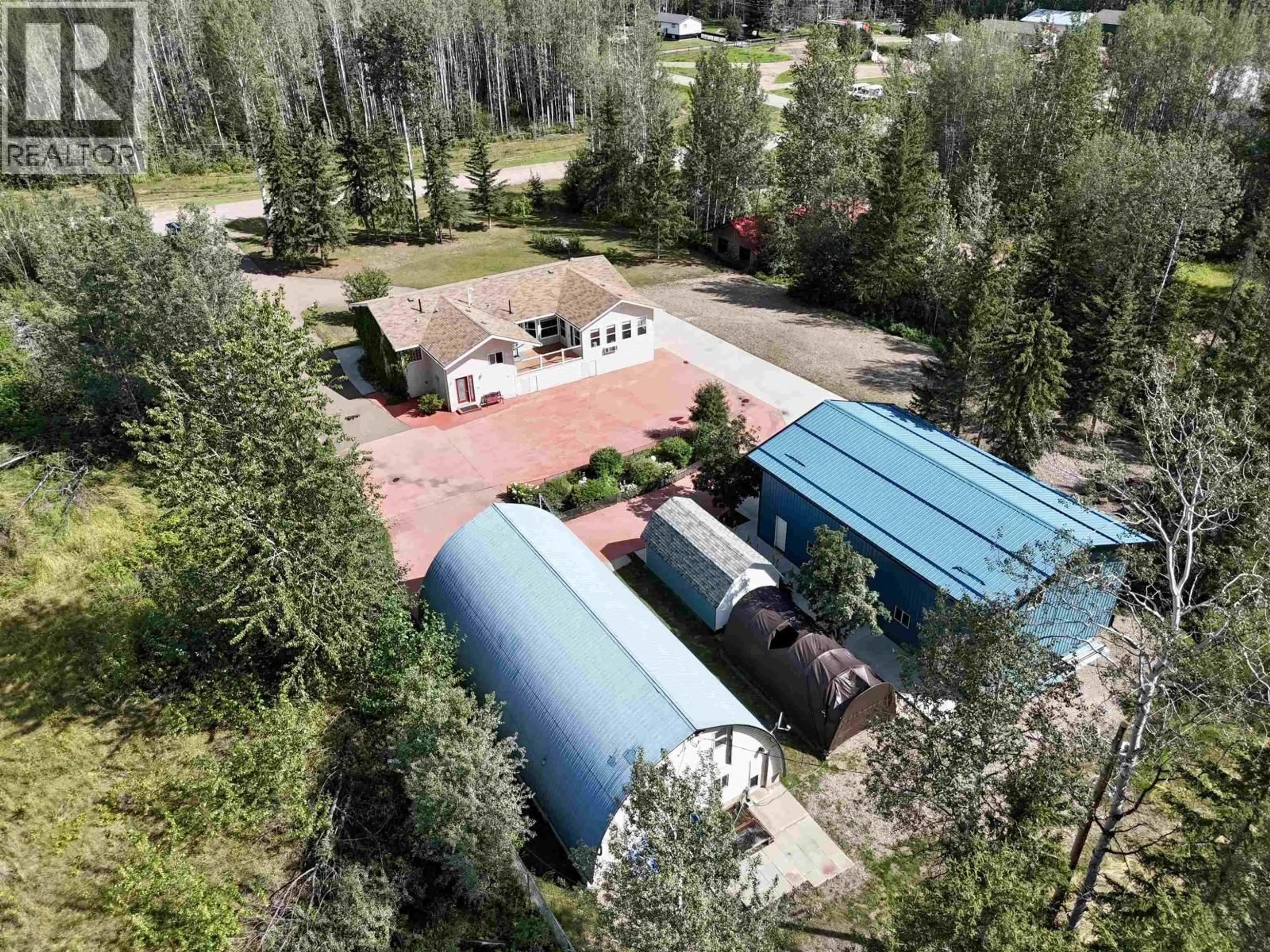 A pic from outside/outdoor area/front of a property/back of a property/a pic from drone, mountain view for 4 RESERVE ROAD, Fort Nelson British Columbia V0C1R0