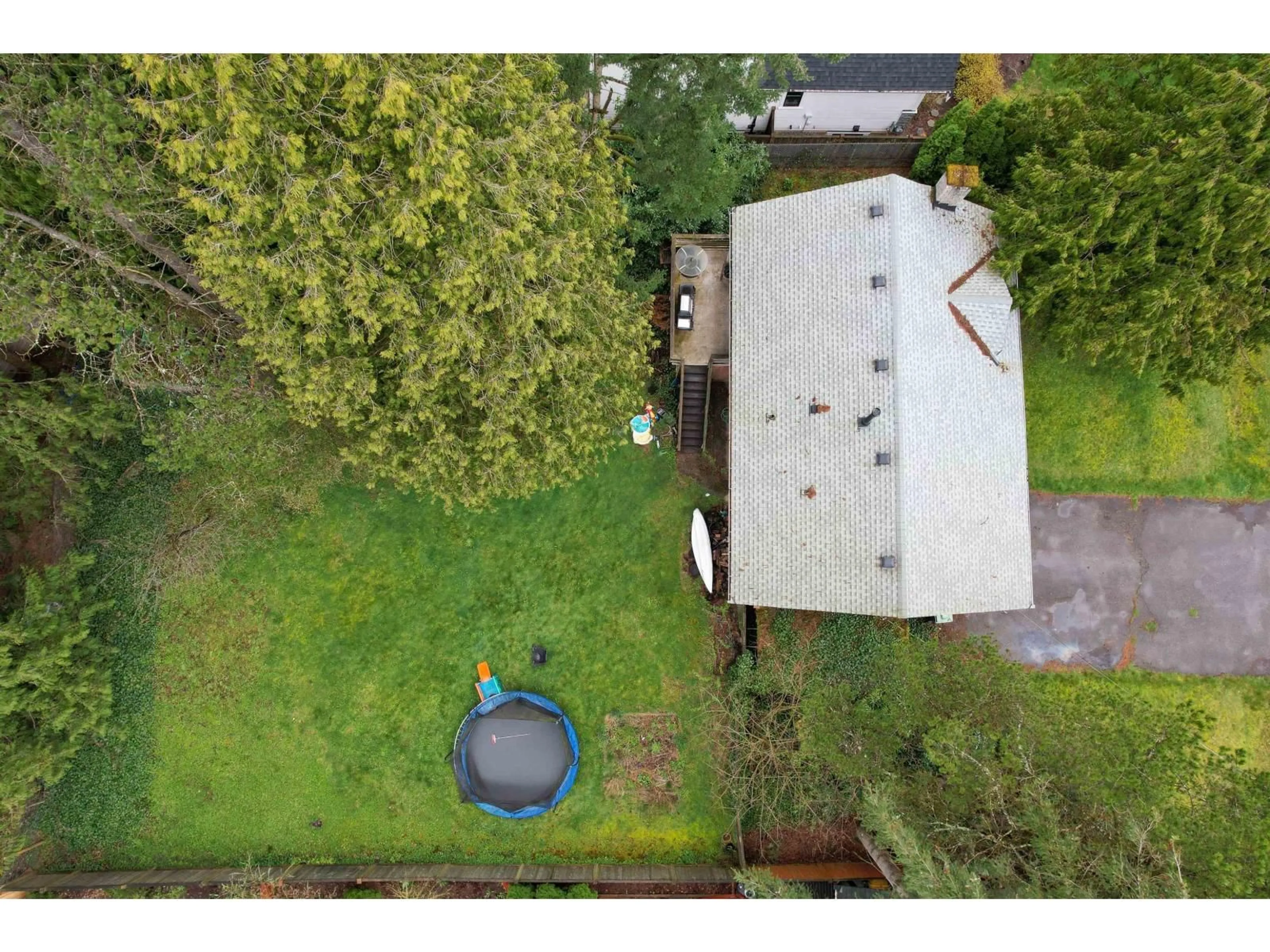 A pic from outside/outdoor area/front of a property/back of a property/a pic from drone, unknown for 4047 204B, Langley British Columbia V3V1A8