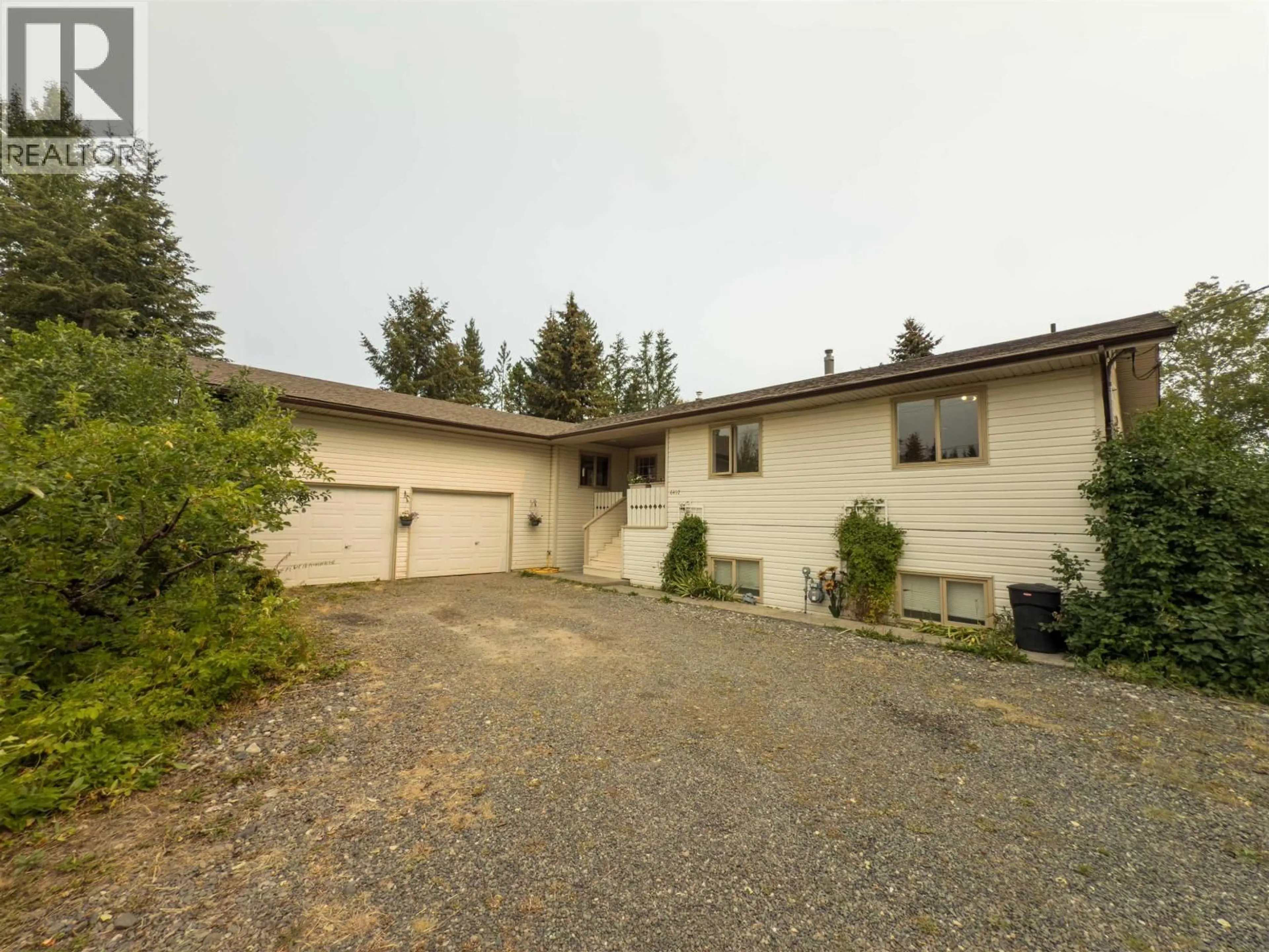 A pic from outside/outdoor area/front of a property/back of a property/a pic from drone, street for 6497 GREY CRESCENT, Horse Lake British Columbia V0K2E3